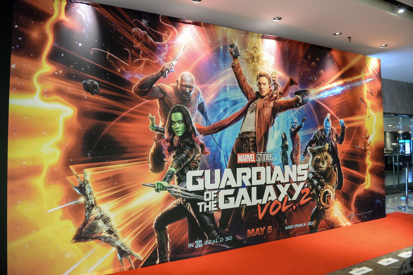 A Guardians of the Galaxy poster with all the main characters, including Rocket, in a collage style.