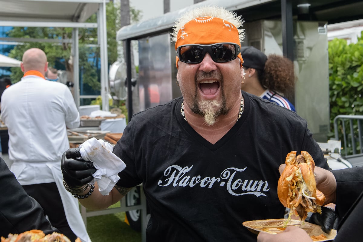 Food Network star, Guy Fieri at a BBQ beach bash and concert in 2018