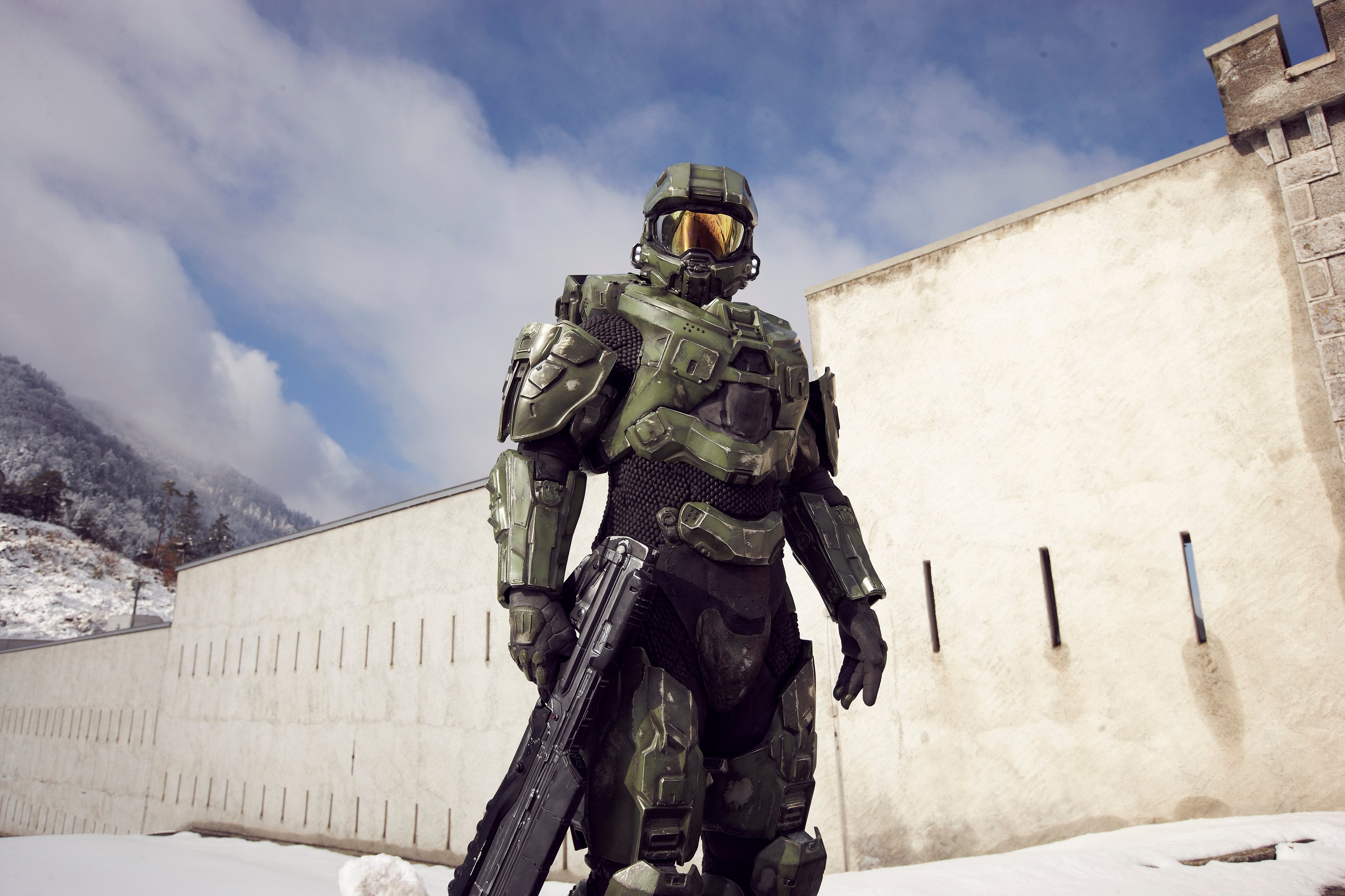 Halo Master Chief holds his gun at his side