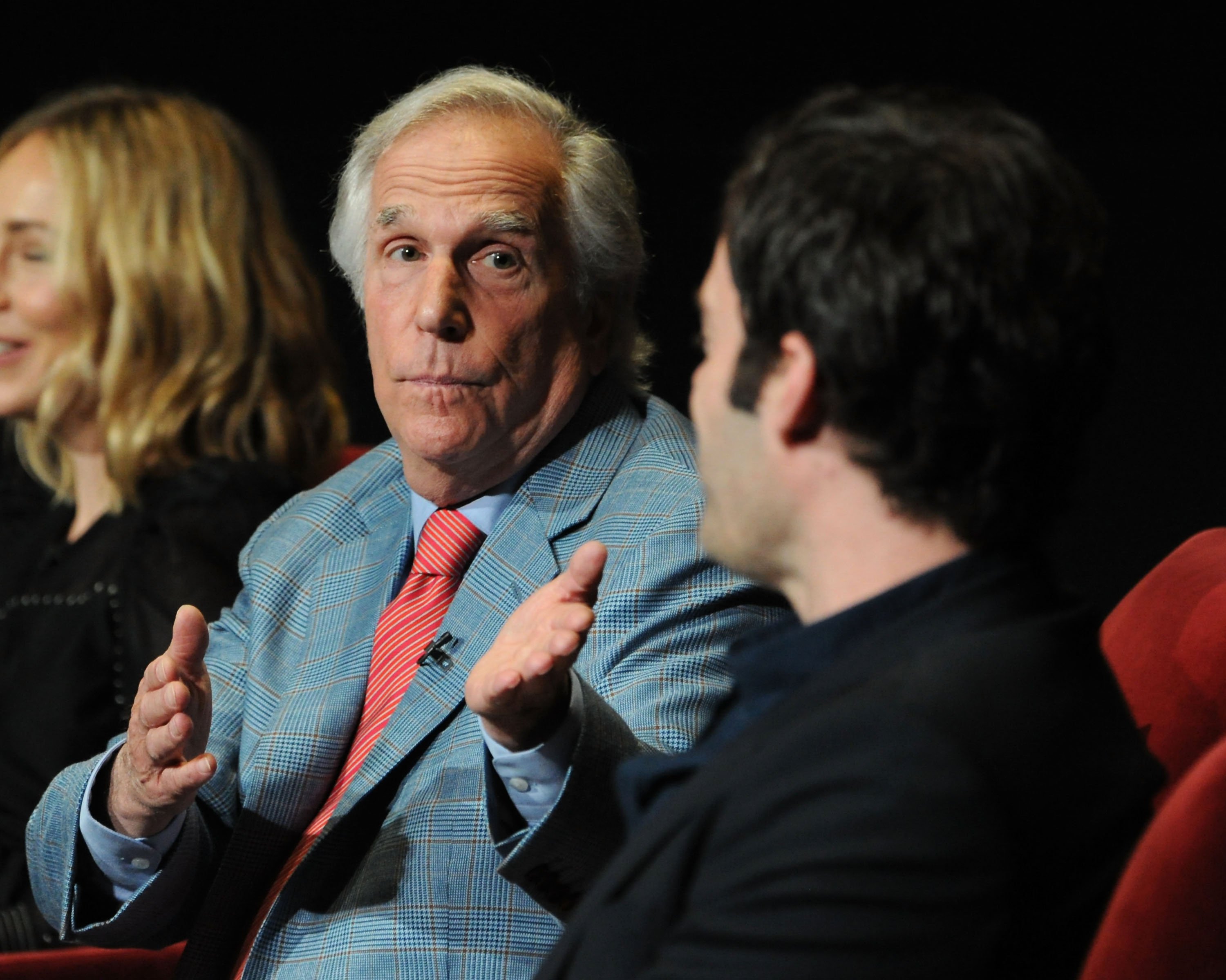 Henry Winkler gesturing to Bill Hader during discussion about 'Barry'