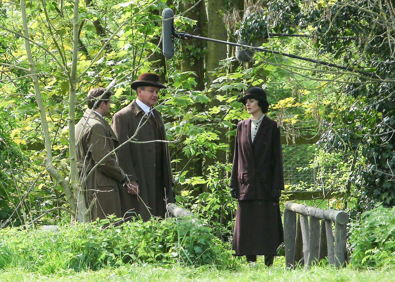 Hugh Bonneville, Allen Leech, and Michelle Dockery on the set of 'Downton Abbey.'