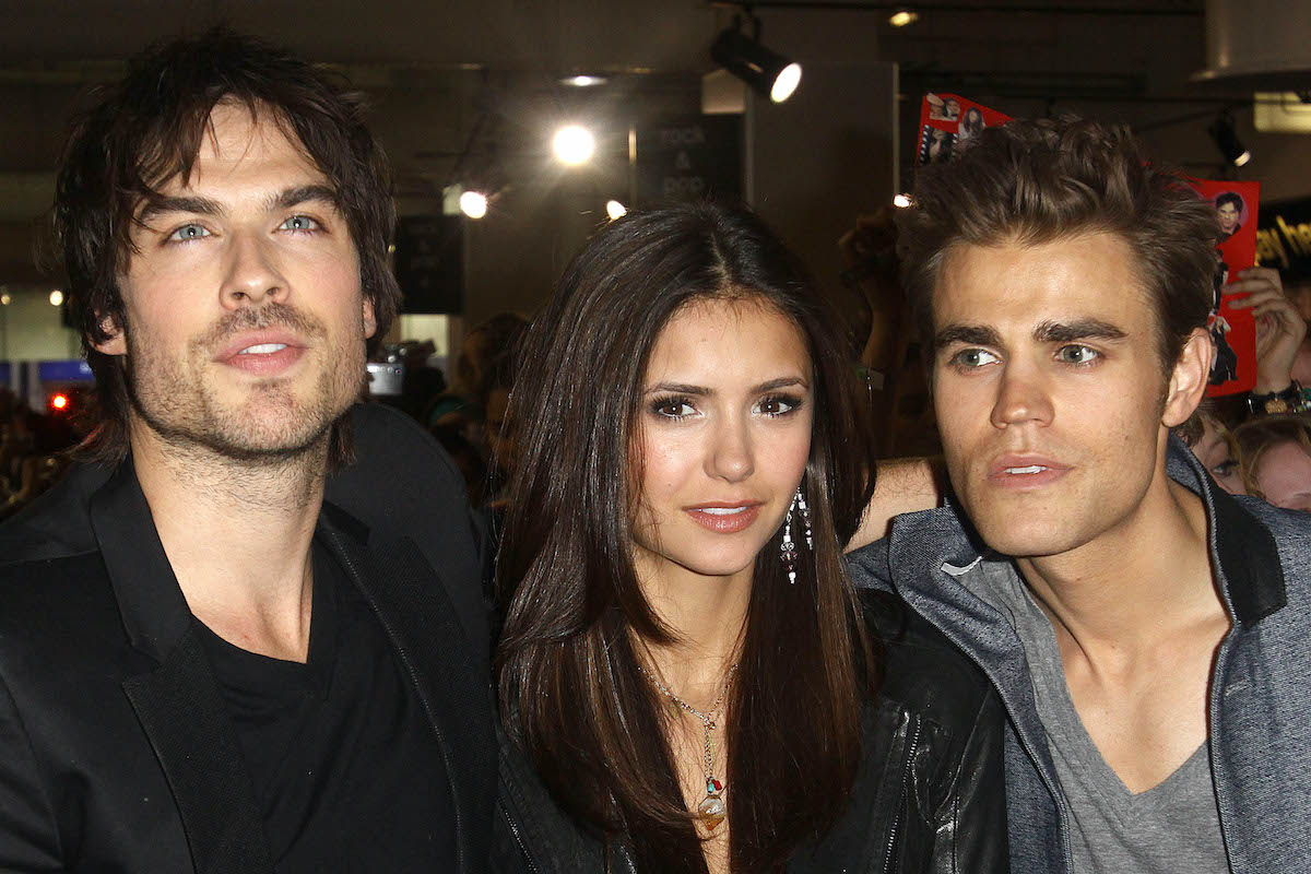 'The Vampire Diaries' stars Ian Somerhalder, Nina Dobrev, and Paul Wesley stand closely together as they pose for photos among fans of The CW series.