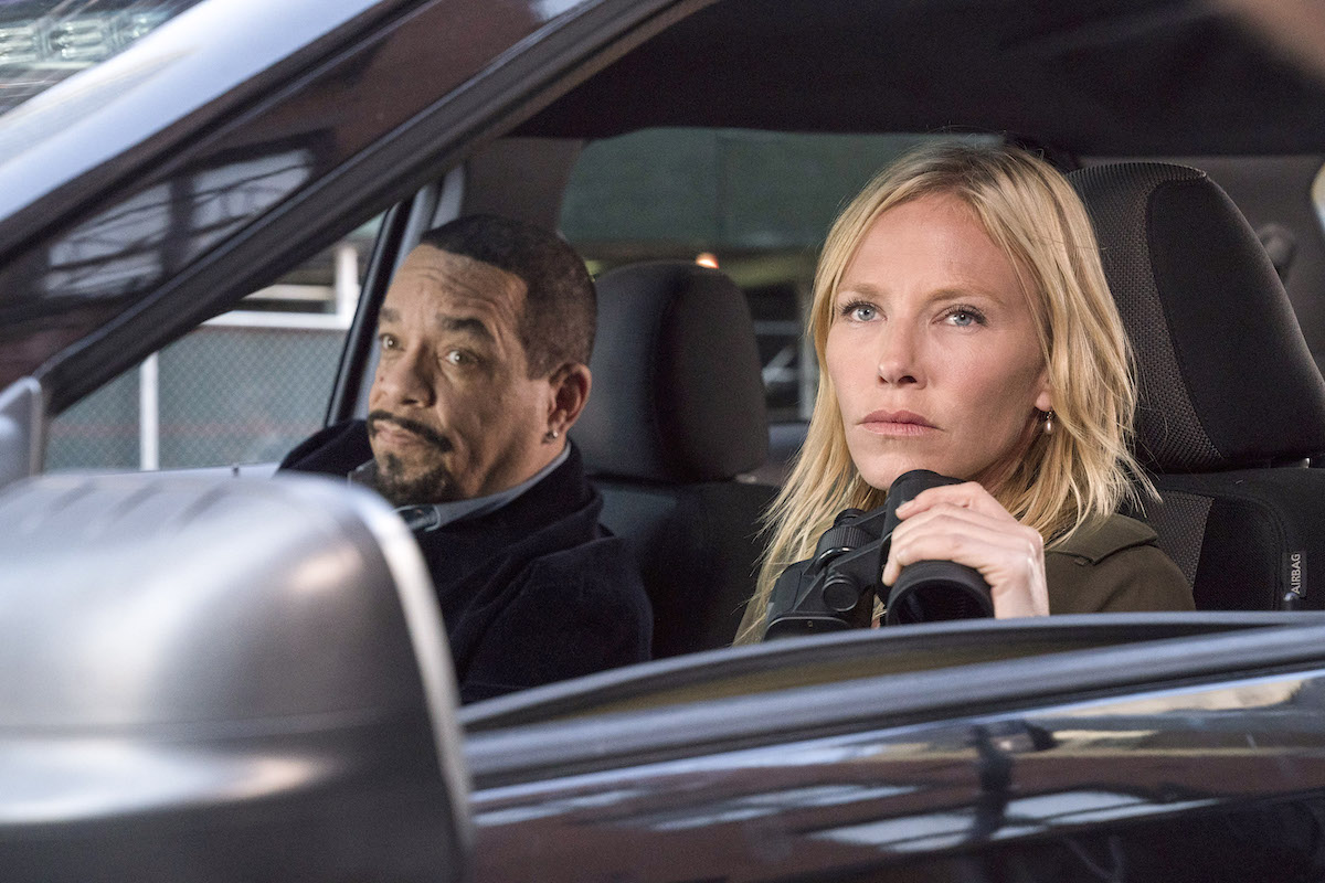 Ice-T and Kelli Giddish sitting in a car