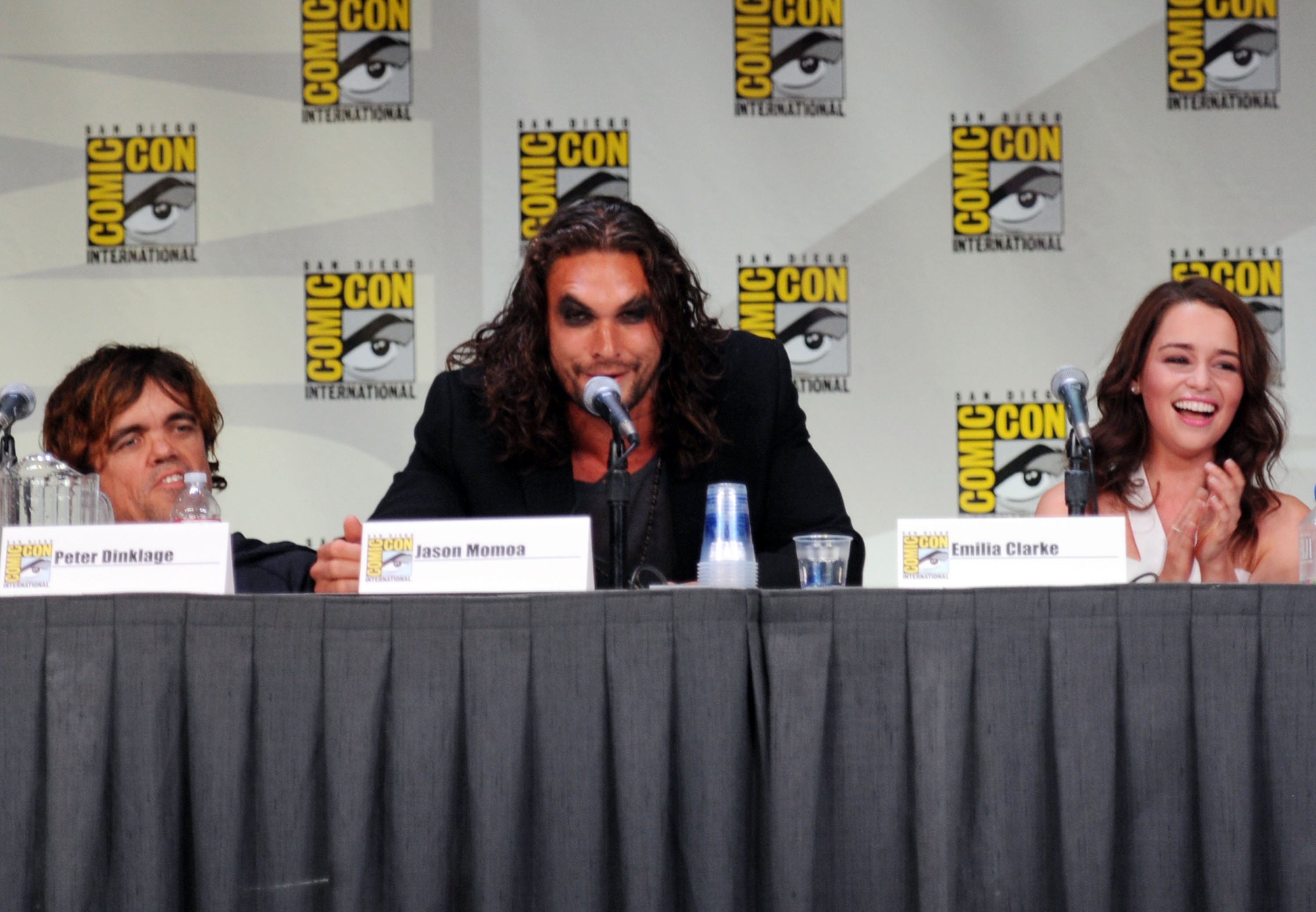 Peter Dinklage, Jason Momoa, and Emilia Clarke at Comic-Con 2011.