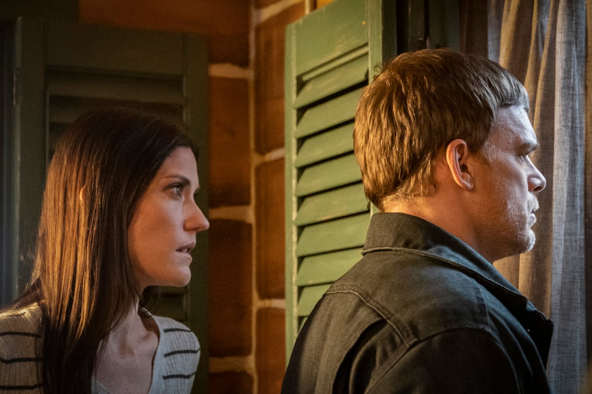 Jennifer Carpenter creeps up behind Michael C. Hall in the Showtime reboot 'Dexter: New Blood'