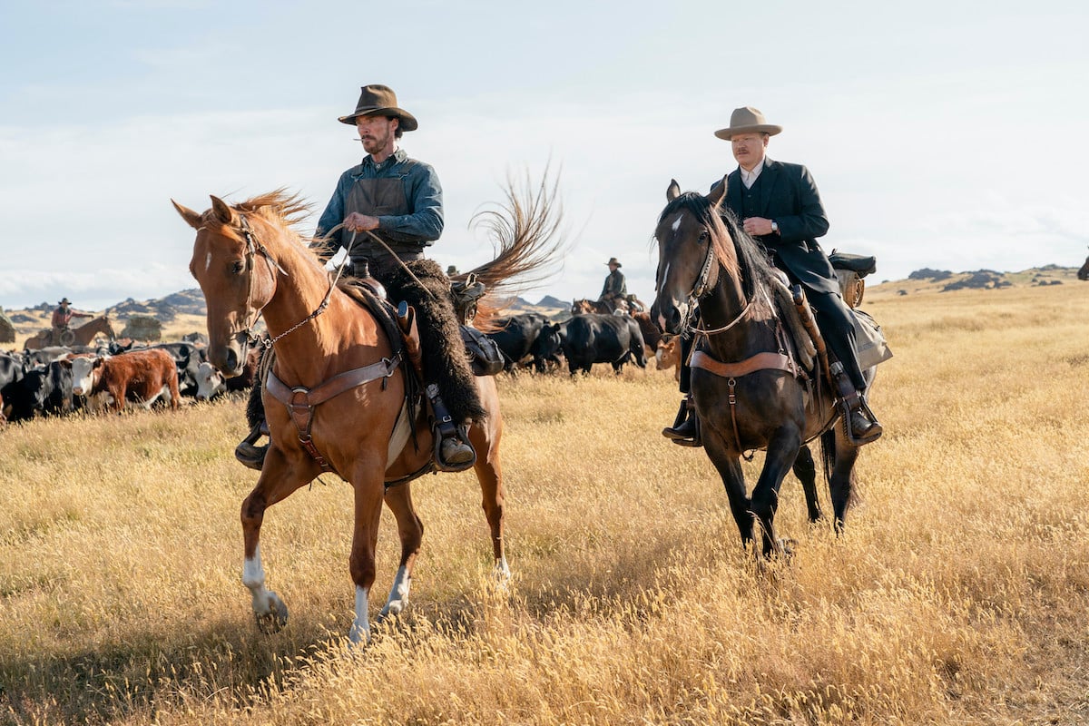 Benedict Cumberbatch as Phil Burbank, Jesse Plemons as George Burbank in 'The Power of the Dog'