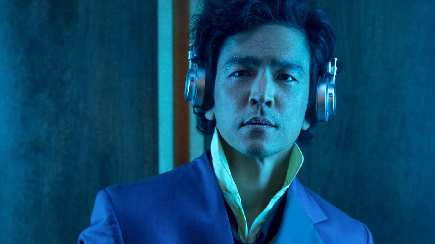 John Cho 'Cowboy Bebop' wearing headphones dressed as Spike Spiegel