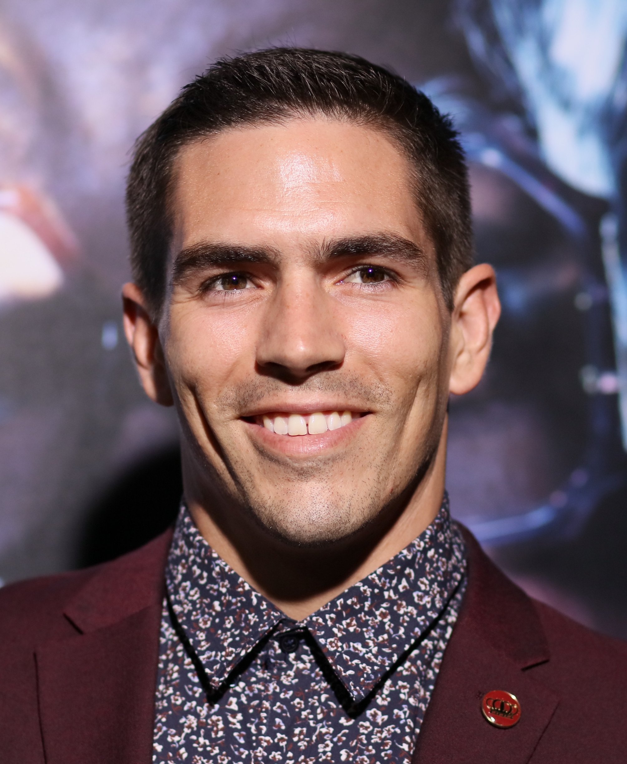 A close-up of Jordan Wiseley from MTV's 'The Challenge' in a suit at an event