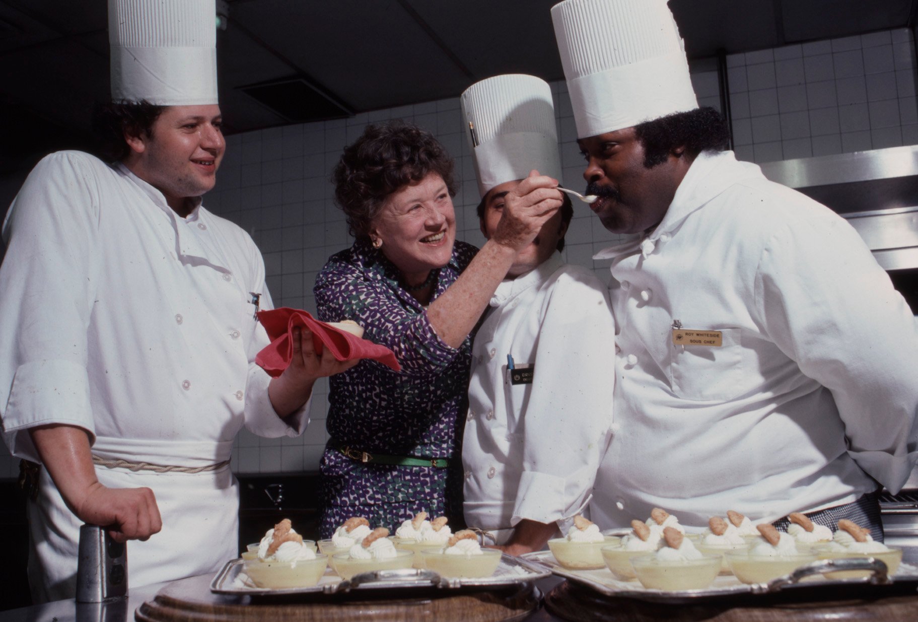 Julia Child is seen cooking with other chefs in 1979