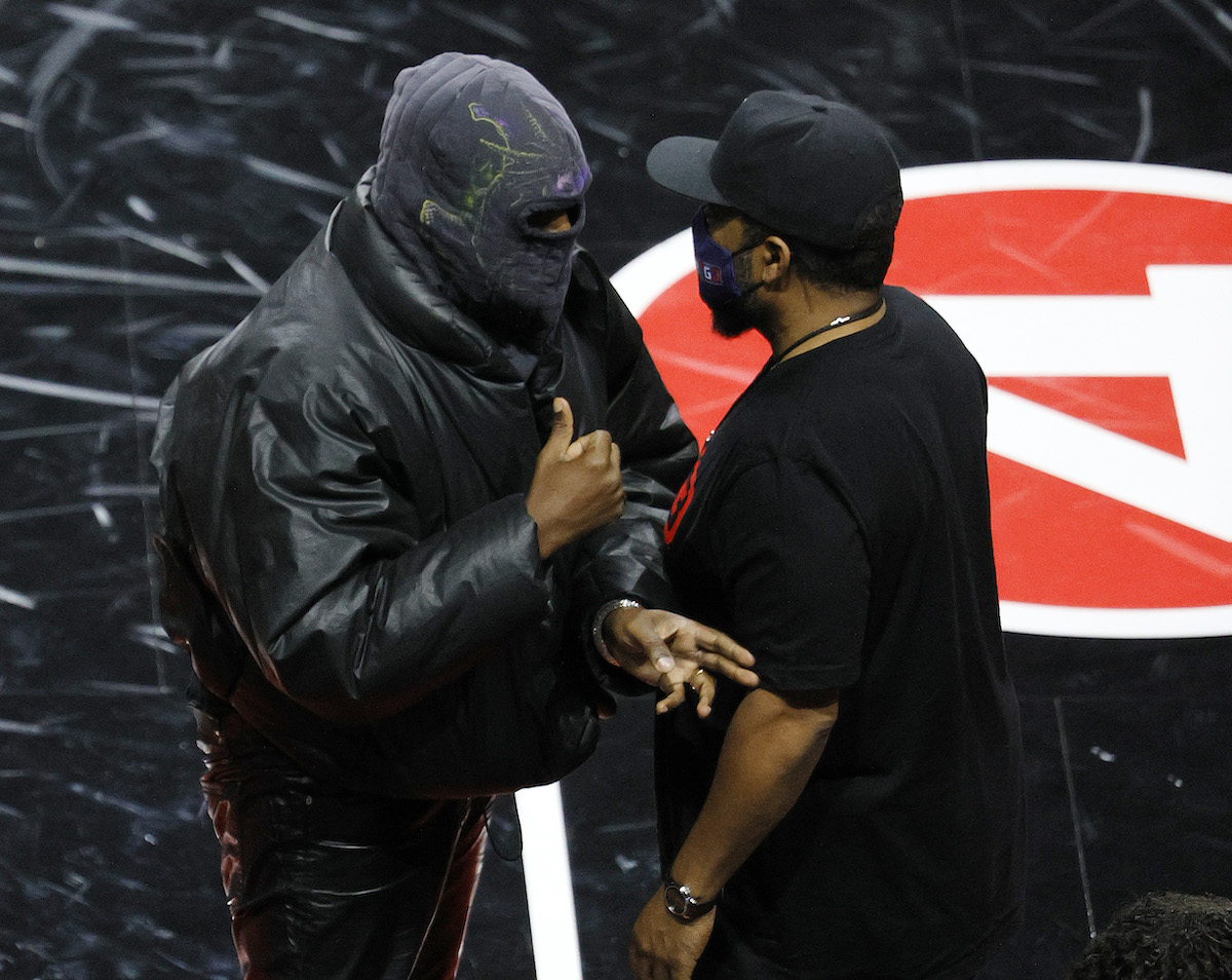 Rapper Kanye West (L) and BIG3 Co-Founder Ice Cube talk after a game between Killer 3's and 3's Company during the second week of the BIG3 at the Orleans Arena on July 17, 2021 in Las Vegas, Nevada.