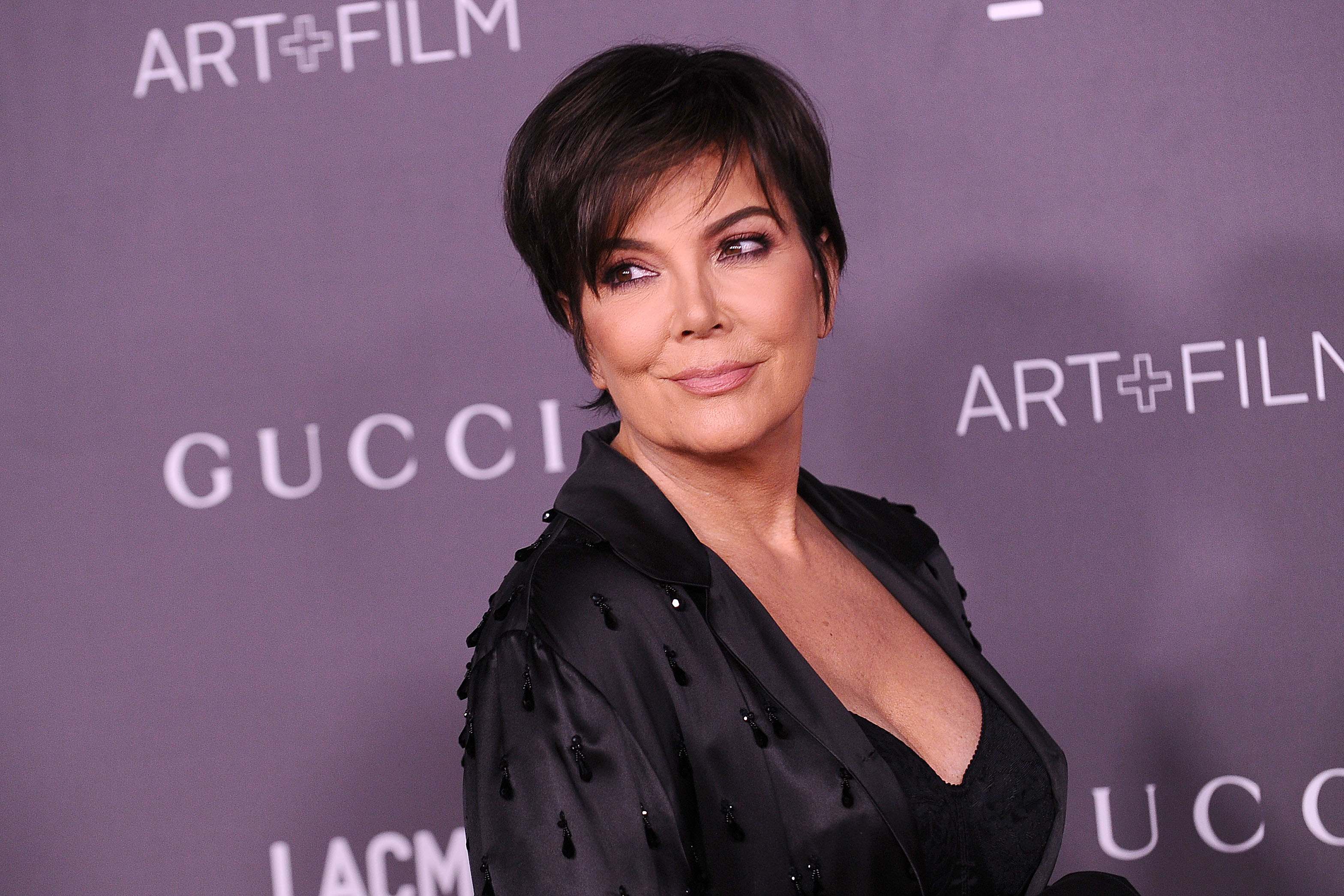 Kris Jenner poses for a photo on the red carpet at the LACMA Art + Film gala