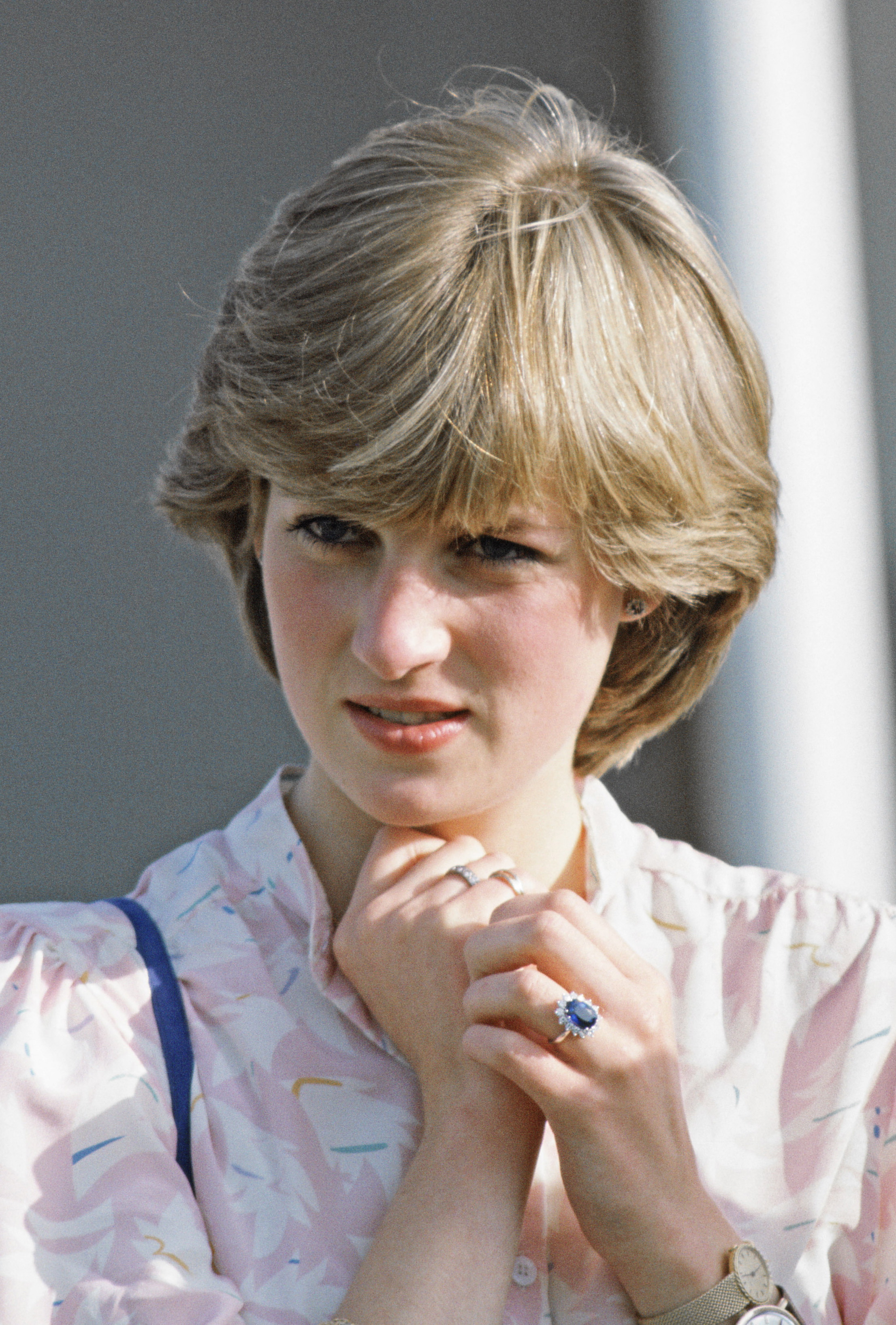 Lady Diana Spencer (later Princess Diana) looking on at the Guards Polo Club