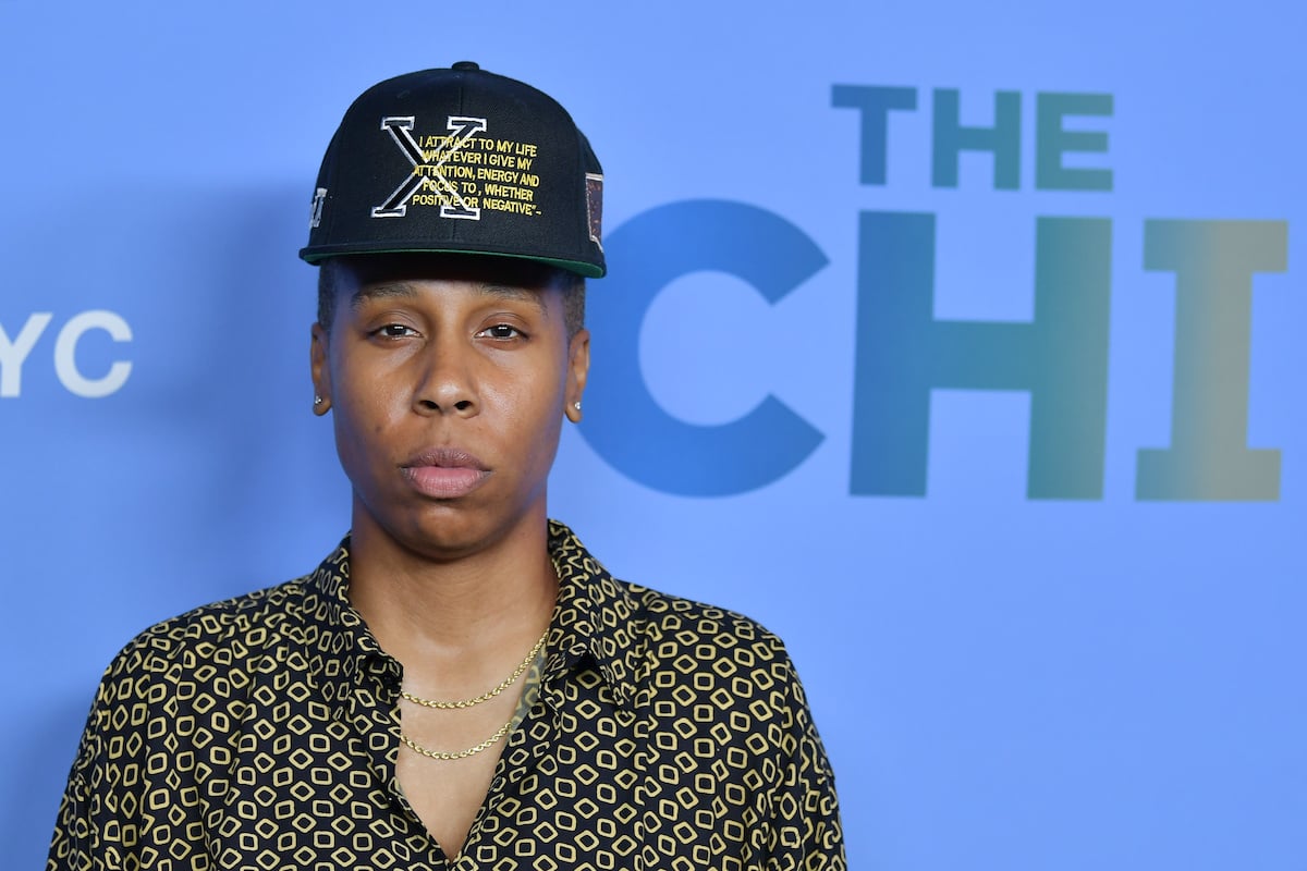 Lena Waithe at a TV event, wearing a shirt and baseball cap