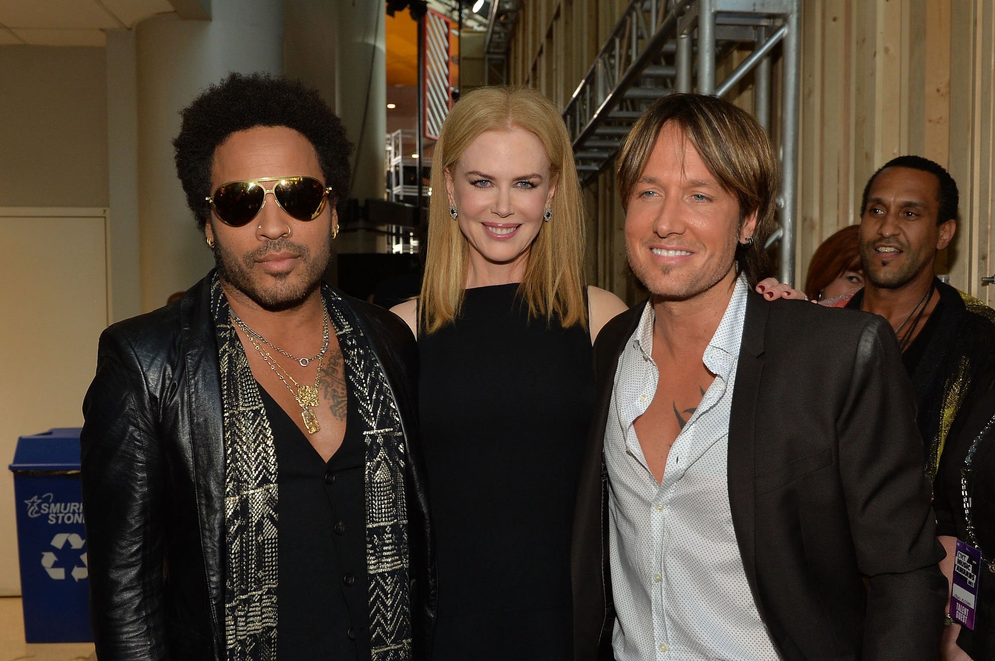 Lenny Kravitz posing with Nicole Kidman and her husband Keith Urban backstage at the 2013 CMT Music Awards