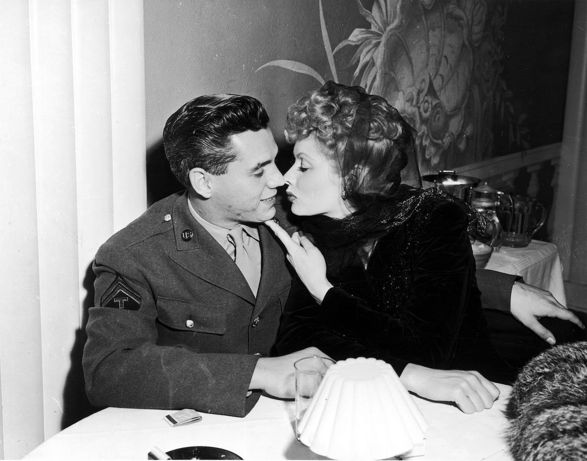 Lucille Ball and Desi Arnaz kiss