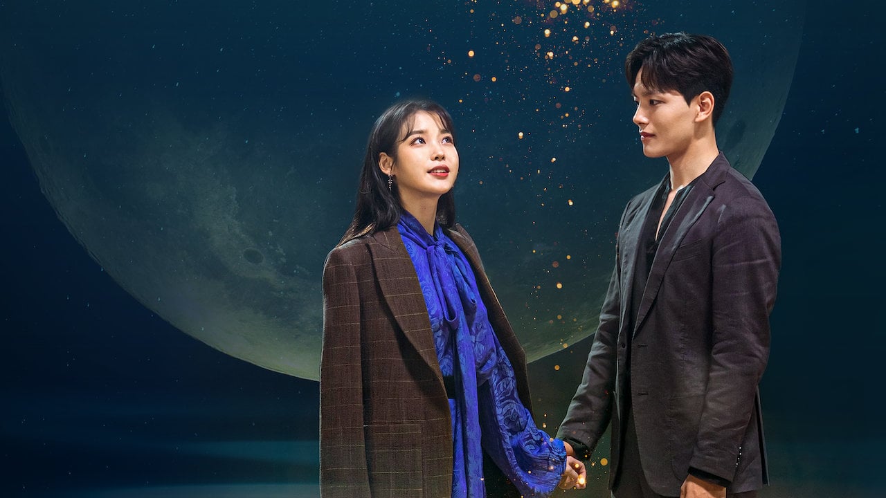 Man-Wol and Chan-Sung 'Hotel Del Luna' holding hands in show poster