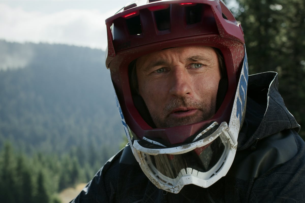 Martin Henderson as Jack Sheridan wearing a motorcycle helmet in