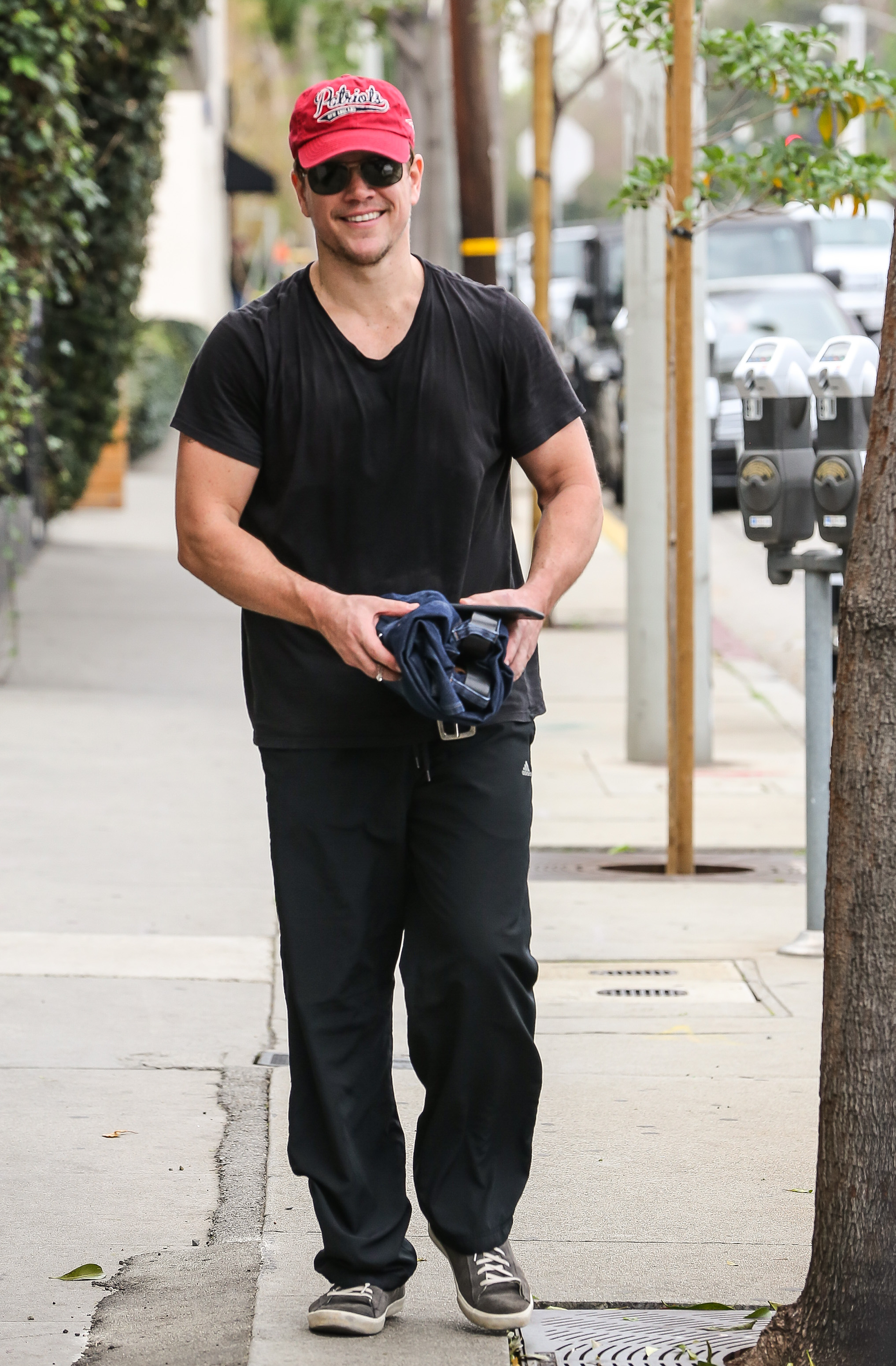 Matt Damon is seen leaving the gym wearing a New England Patriots hat