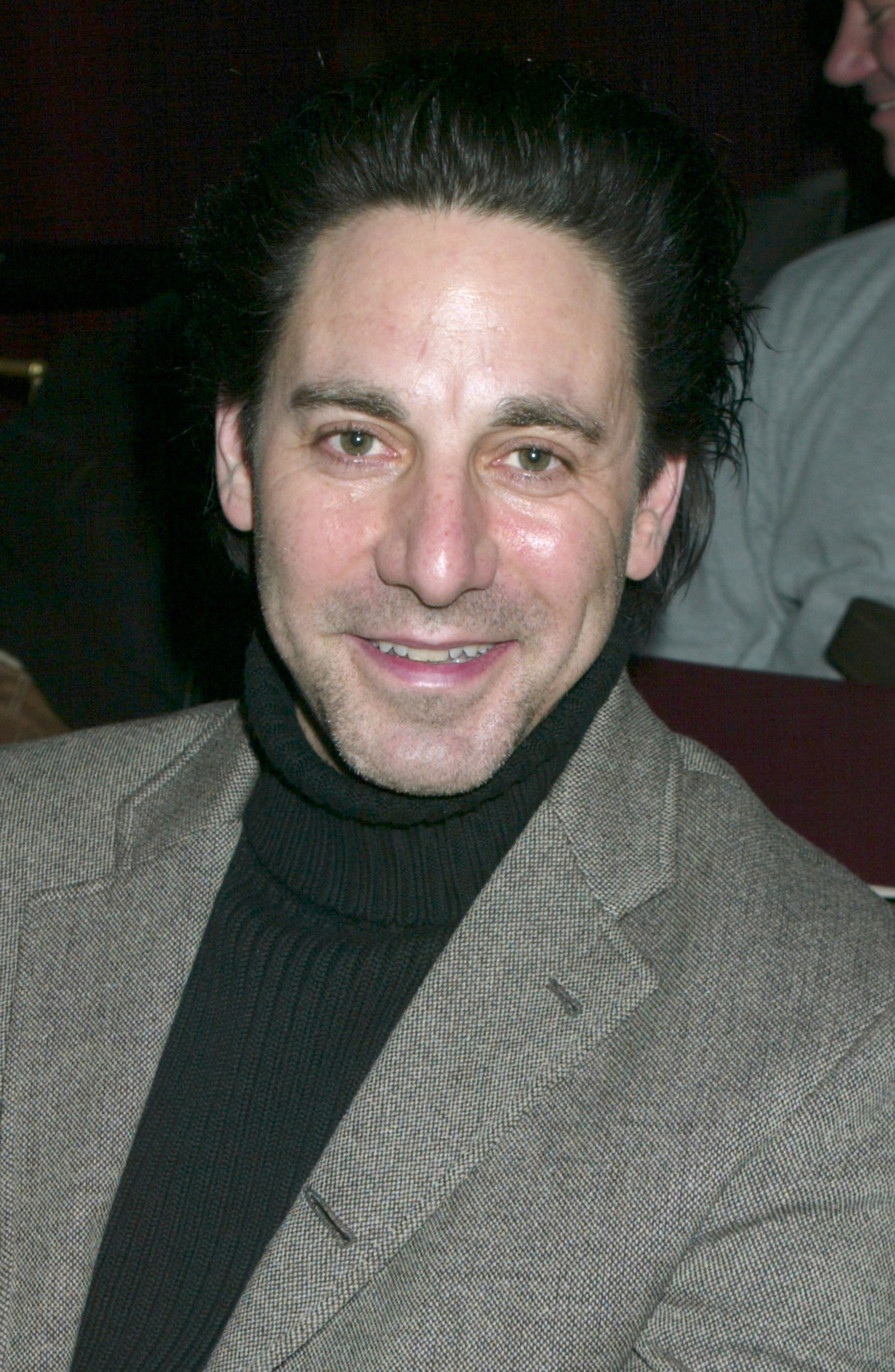 Scott Cohen is photographed at the John Varvatos Men's Fashion Show in 2003 in Bryant Park