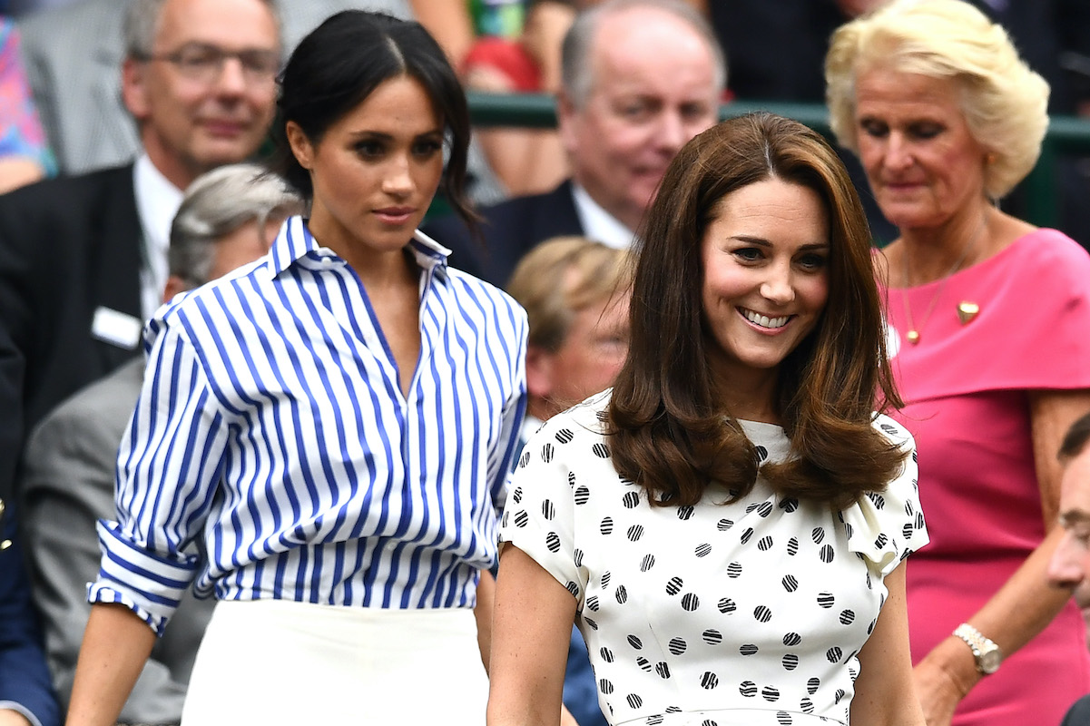 Meghan Markle, Kate Middleton walking down steps at Wimbledon