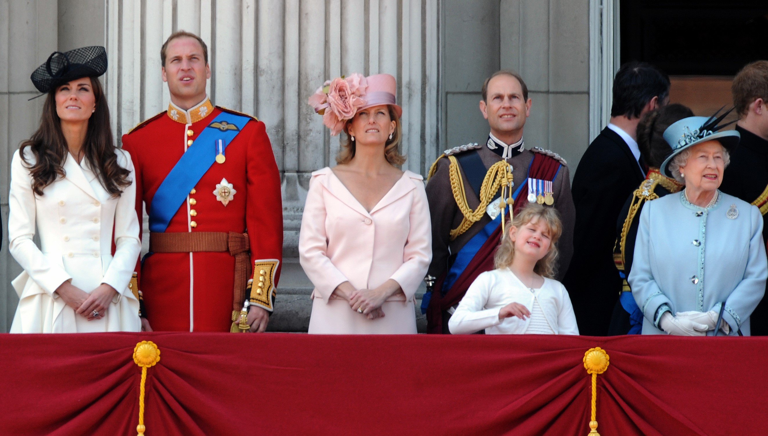 Members of the royal family standing on the balcony of Buckingham Palace following the Trooping The Colour Ceremony