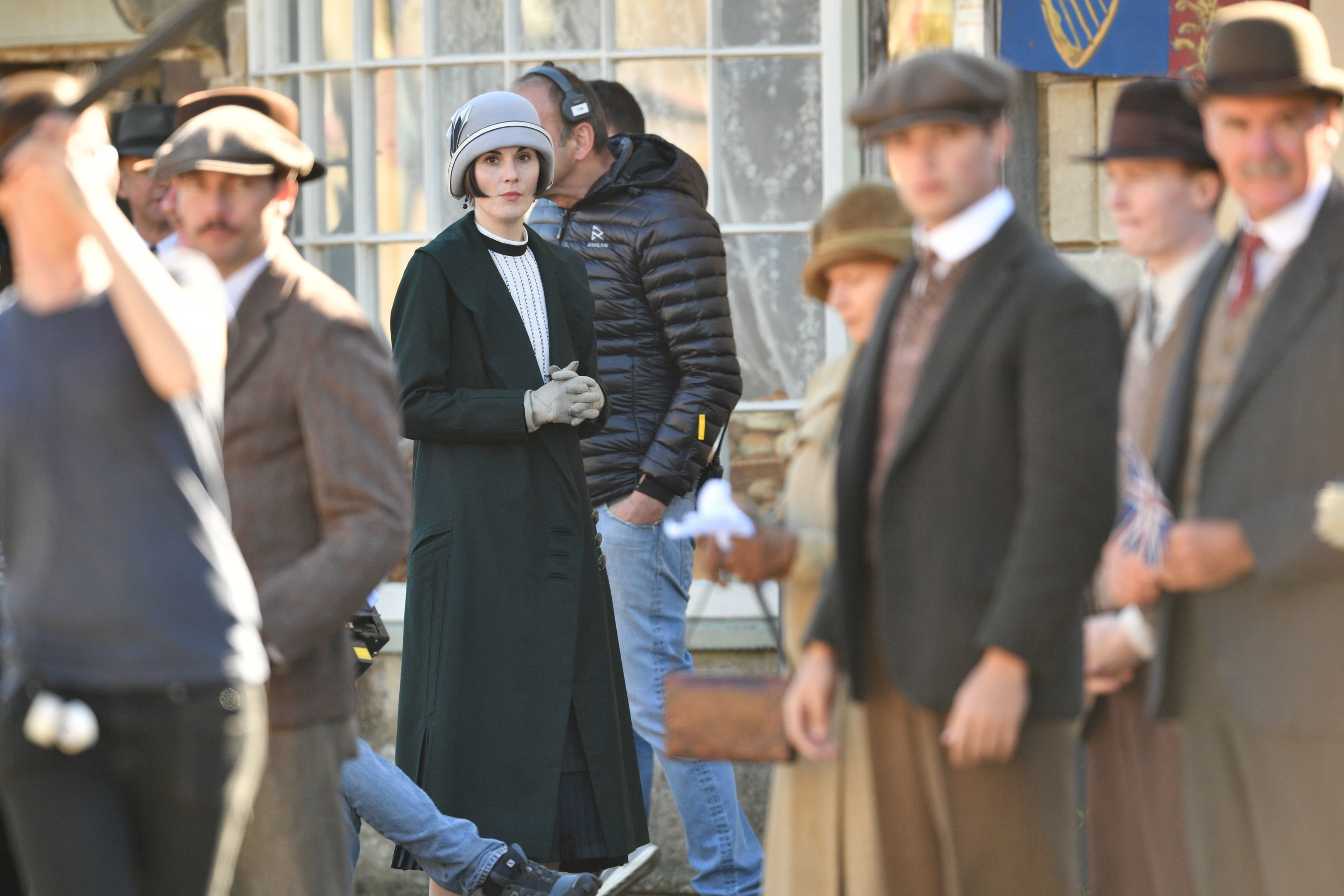 Michelle Dockery and other cast members on the Downton Abbey film set in Lacock, Wiltshire