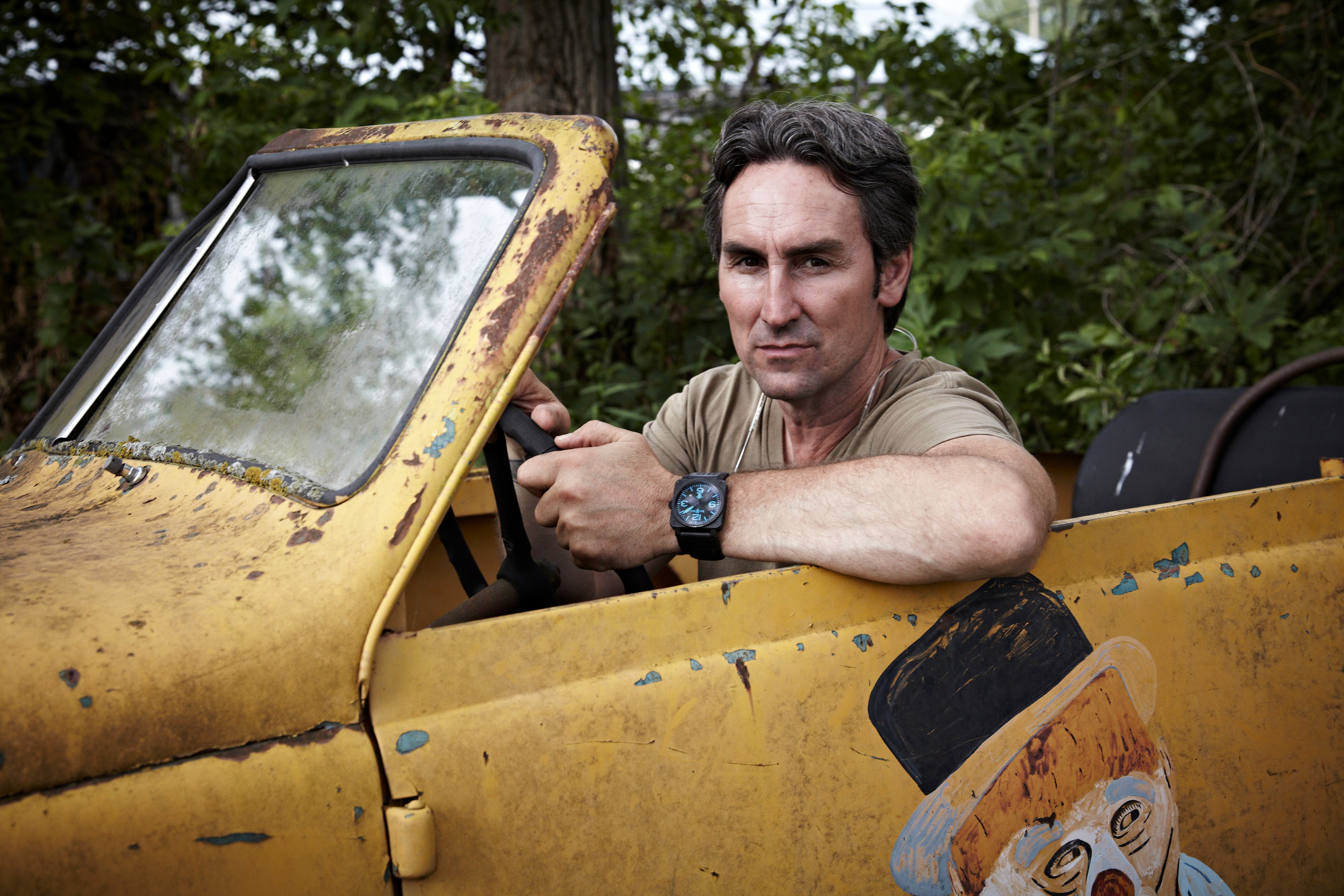 Mike Wolfe of 'American Pickers' behind the wheel of an old car
