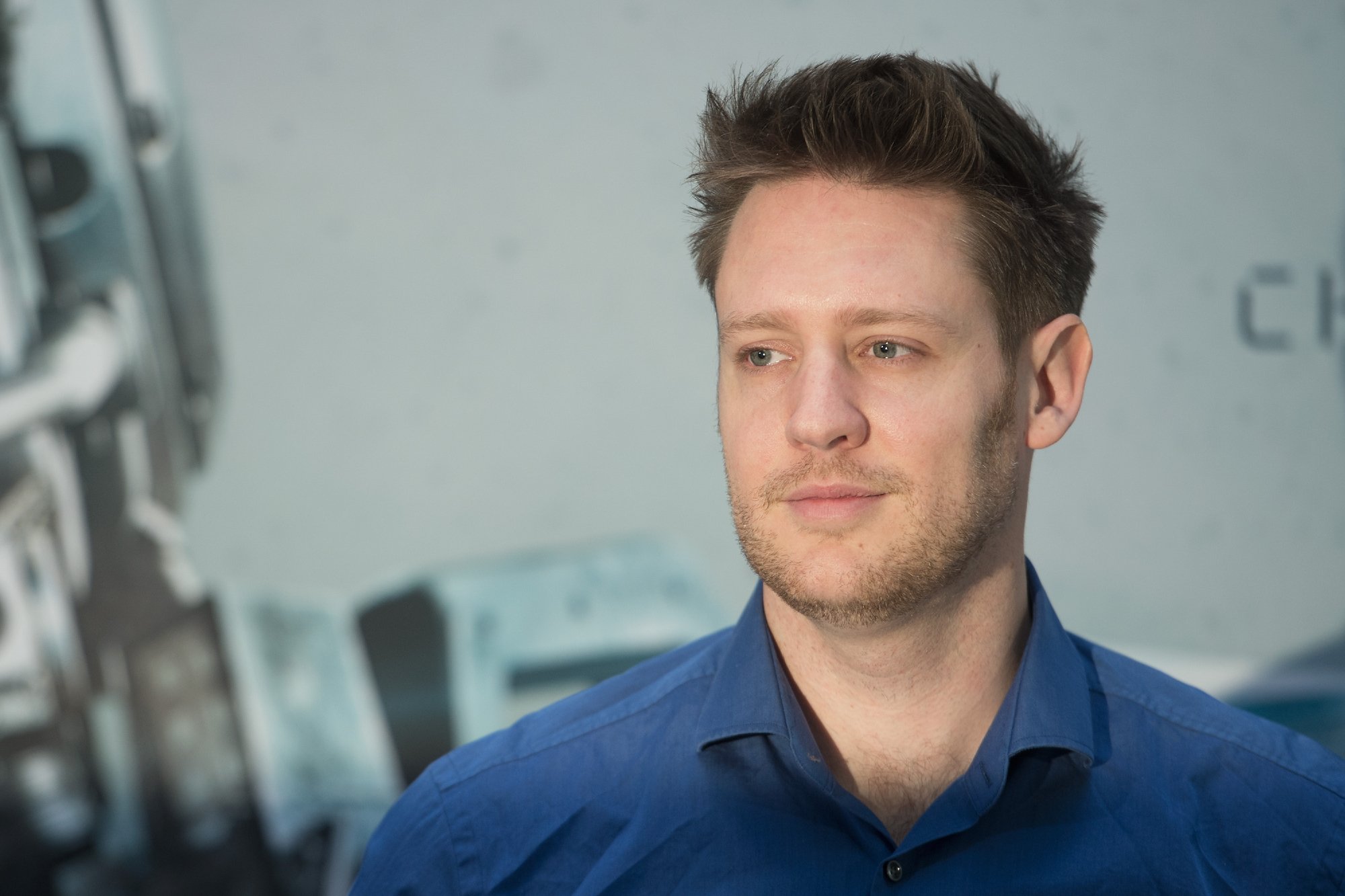 Neill Blomkamp attends a photo call for 'Chappie' in Berlin, Germany