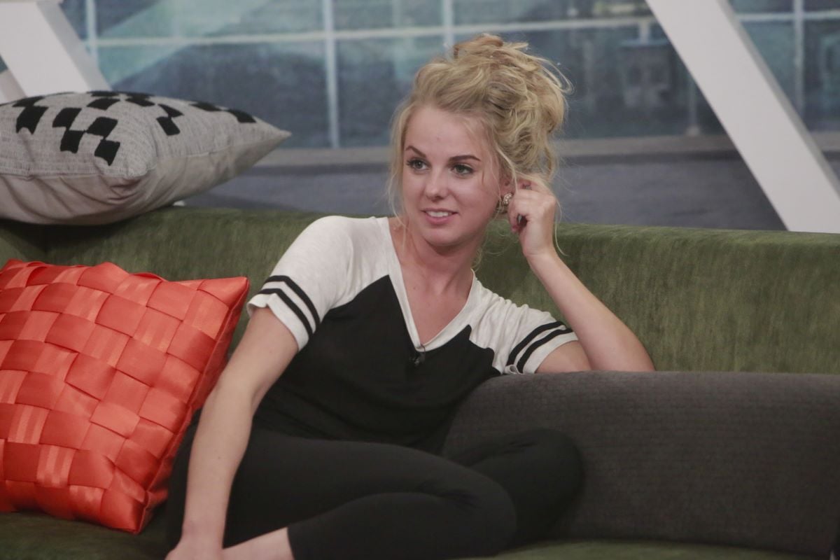 Nicole Franzel sits on a couch on 'Big Brother' 