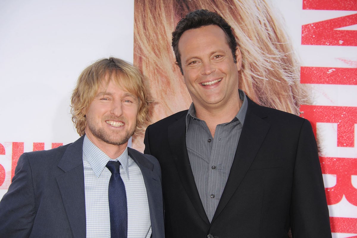 Owen Wilson and Vince Vaughn wearing dark jackets on the red carpet