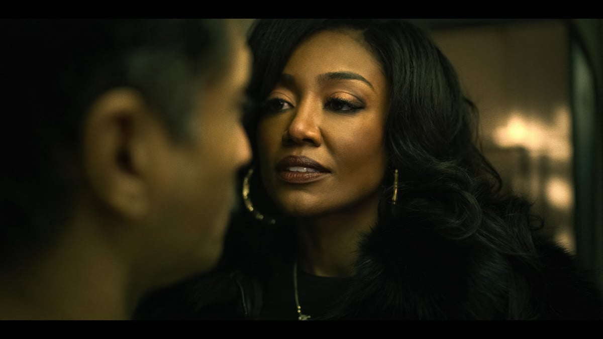Patina Miller gets in a man's face while wearing gold hoops as Raq Thomas in 'Power Book III: Raising Kanan'