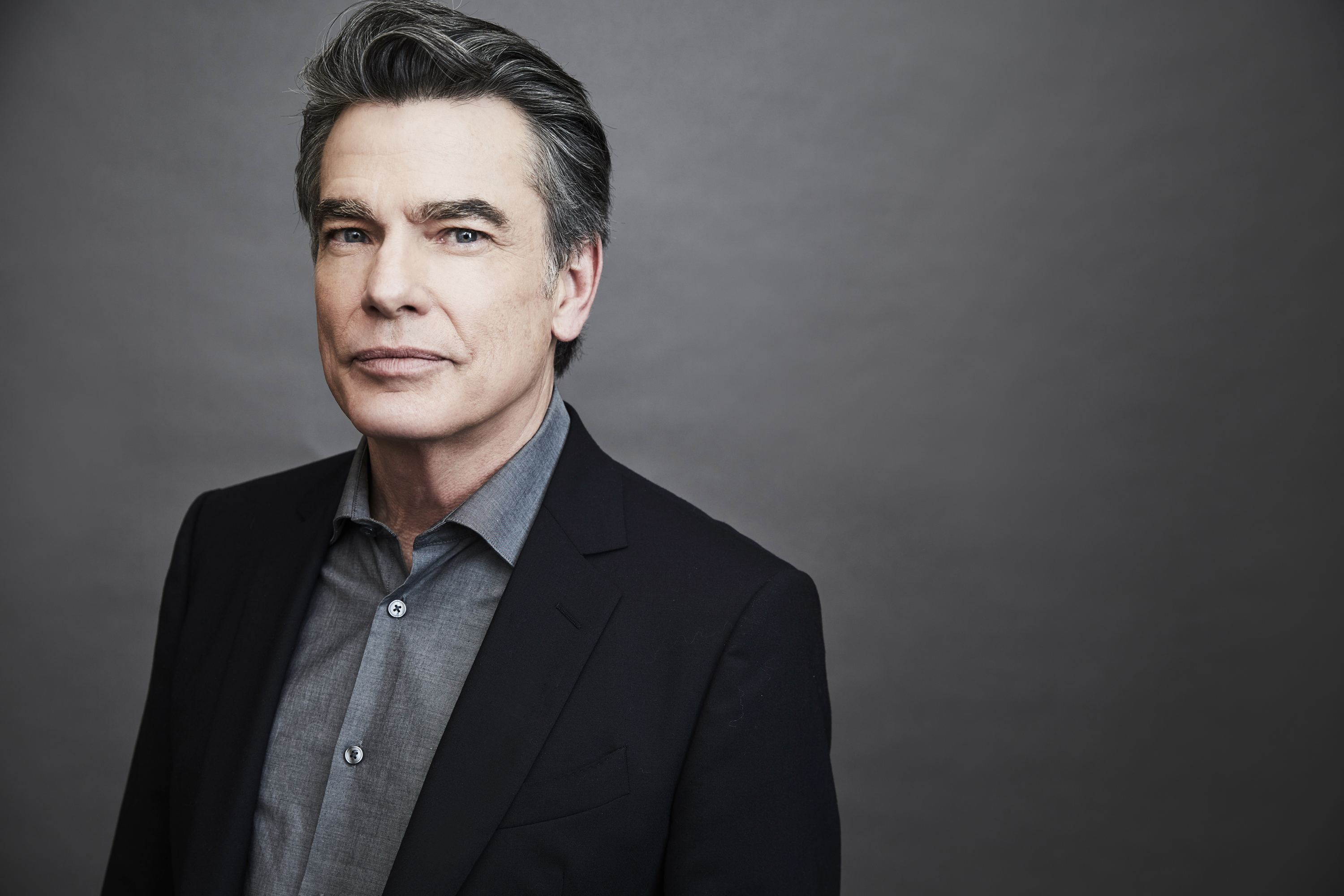 'Grey's Anatomy' newcomer Peter Gallagher in a black suit