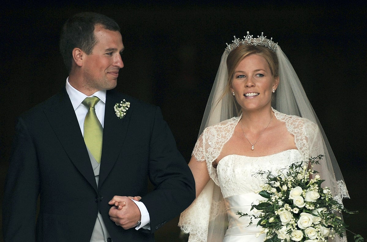 Peter Phillips and bride Autumn Kelly walking out of St. George's Chapel on their wedding day