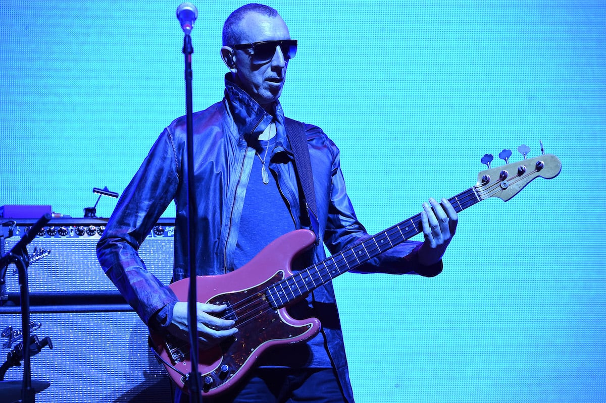 Pino Palladino playing the bass on stage.