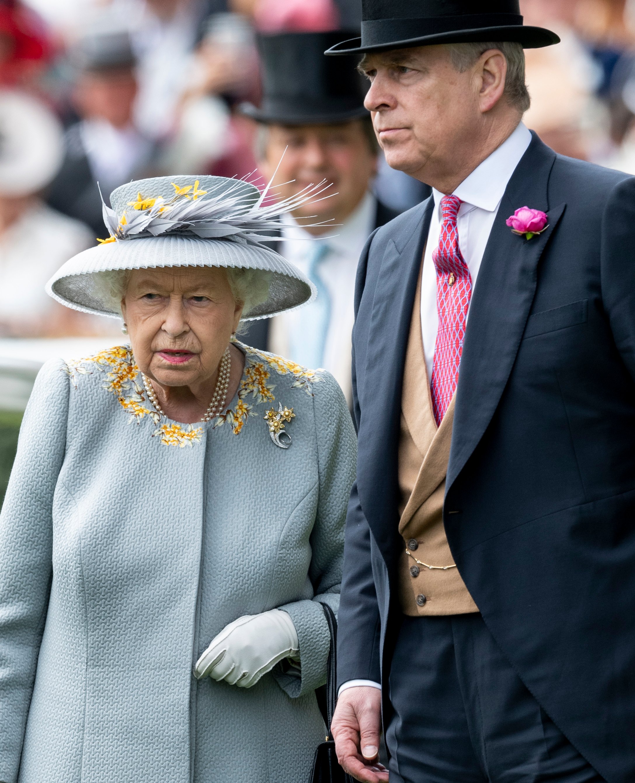 Prince Andrew and Queen Elizabeth II standing together at Ladies Day of Royal Ascot