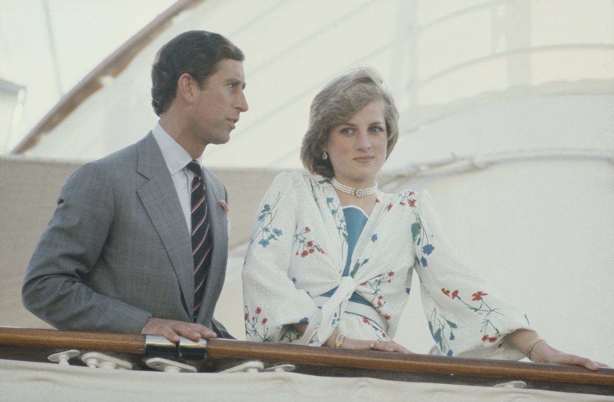 Prince Charles and Princess Diana standing together on board the Royal Yacht Britannia