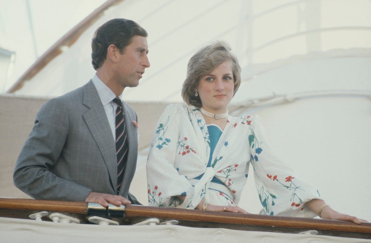 Prince Charles and Princess Diana standing together on board the Royal Yacht Britannia