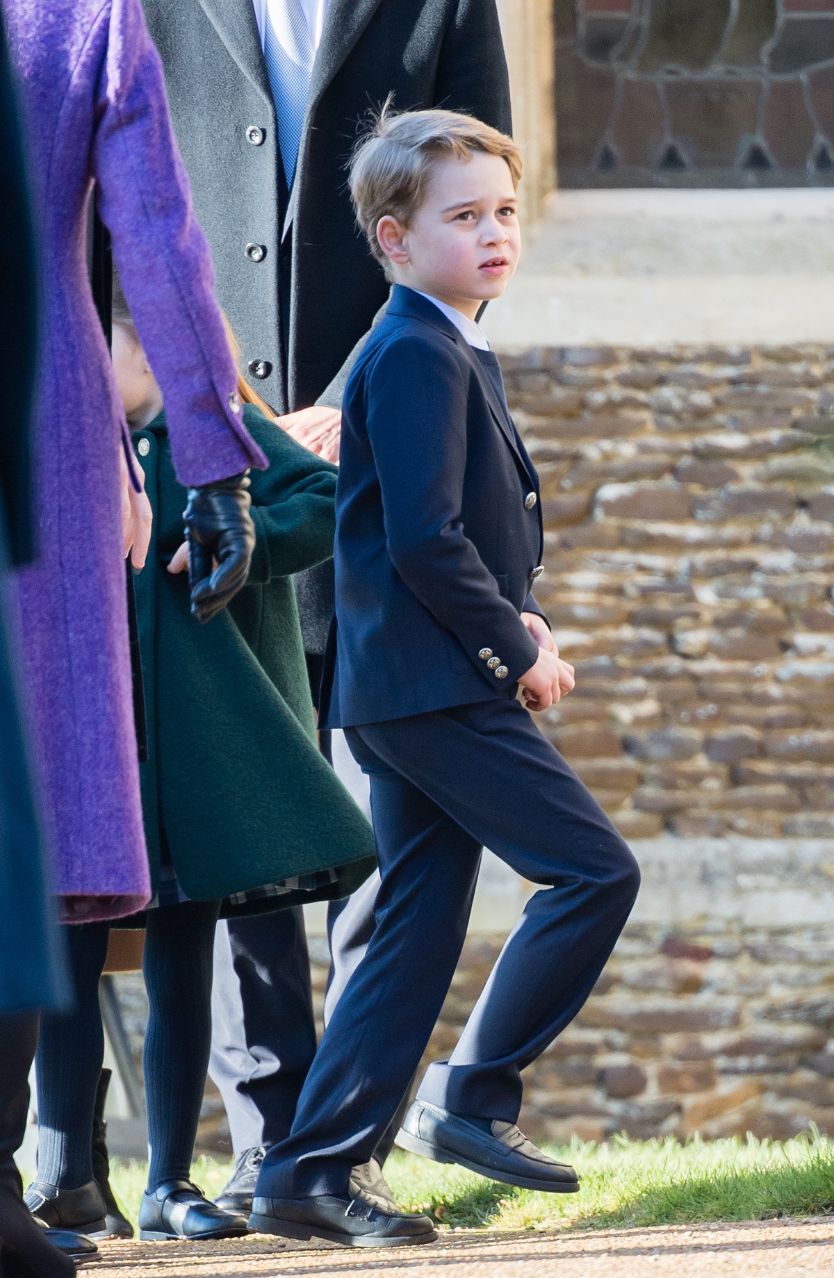 Prince George dressed in a suit for Christmas Day Church service