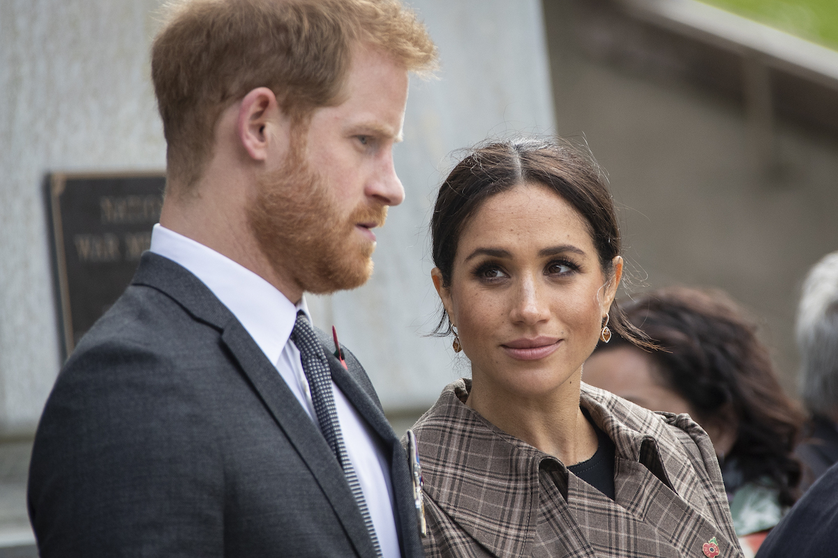 Meghan Markle stares at Prince Harry during a royal event