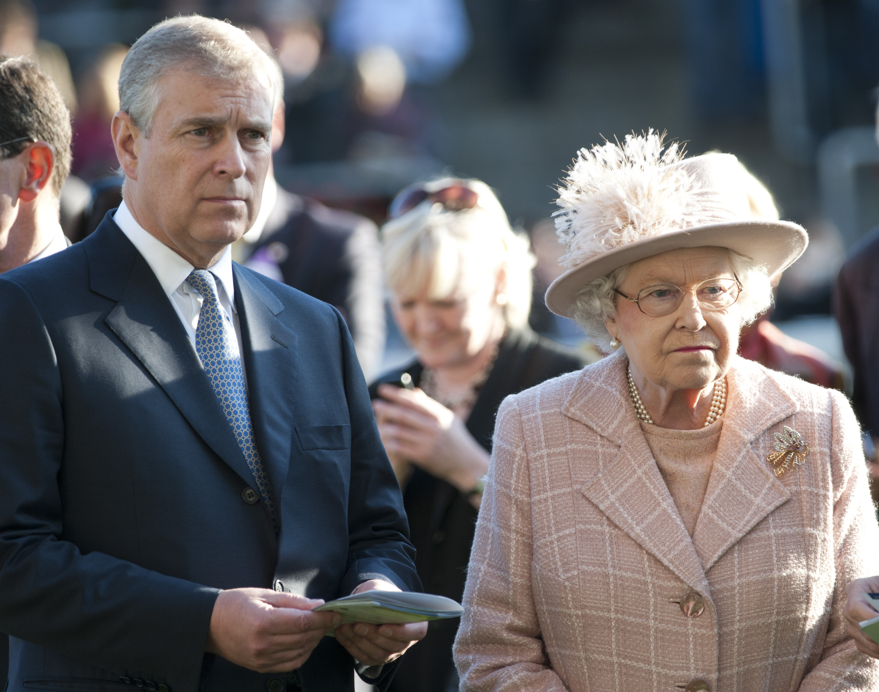 Queen Elizabeth II and Prince Andrew standing next to one another at Ascot Racecourse