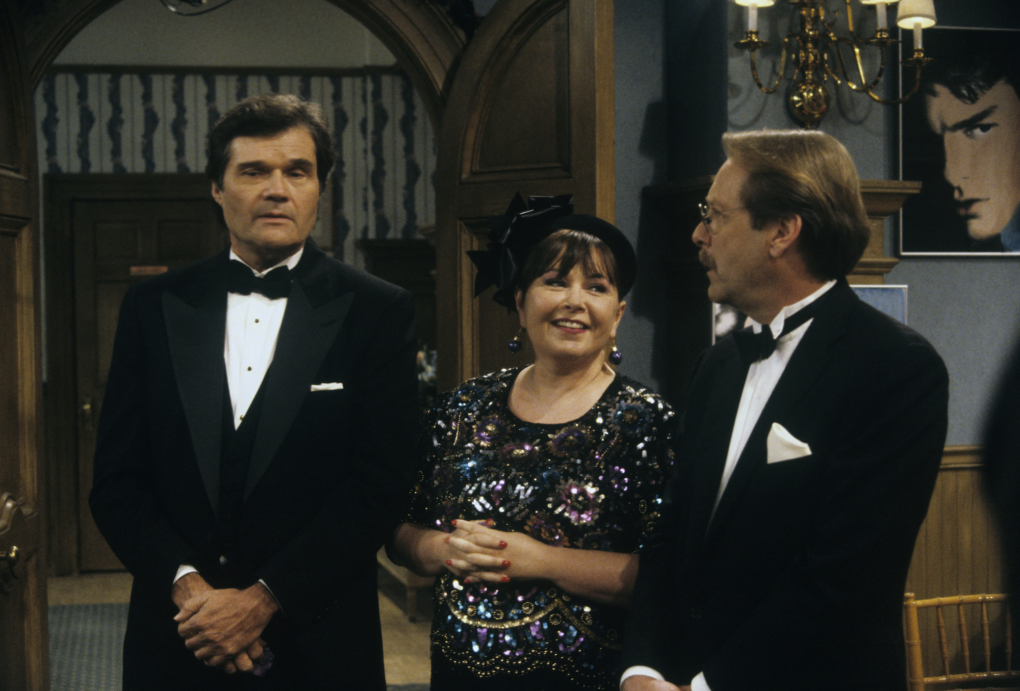 Scott, Roseanne, and Leon at a wedding on 'Roseanne'