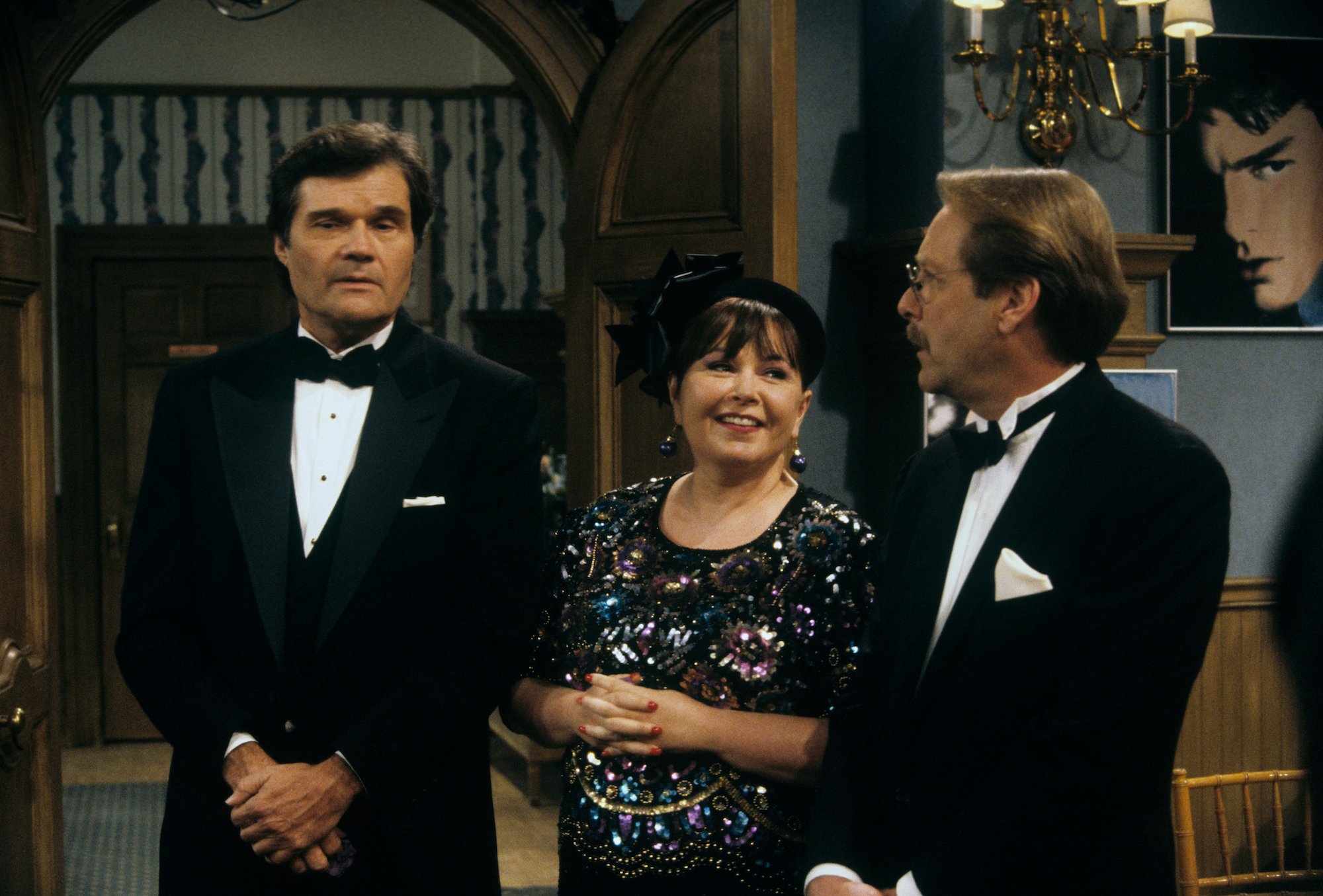 Scott, Roseanne, and Leon at a wedding on 'Roseanne'