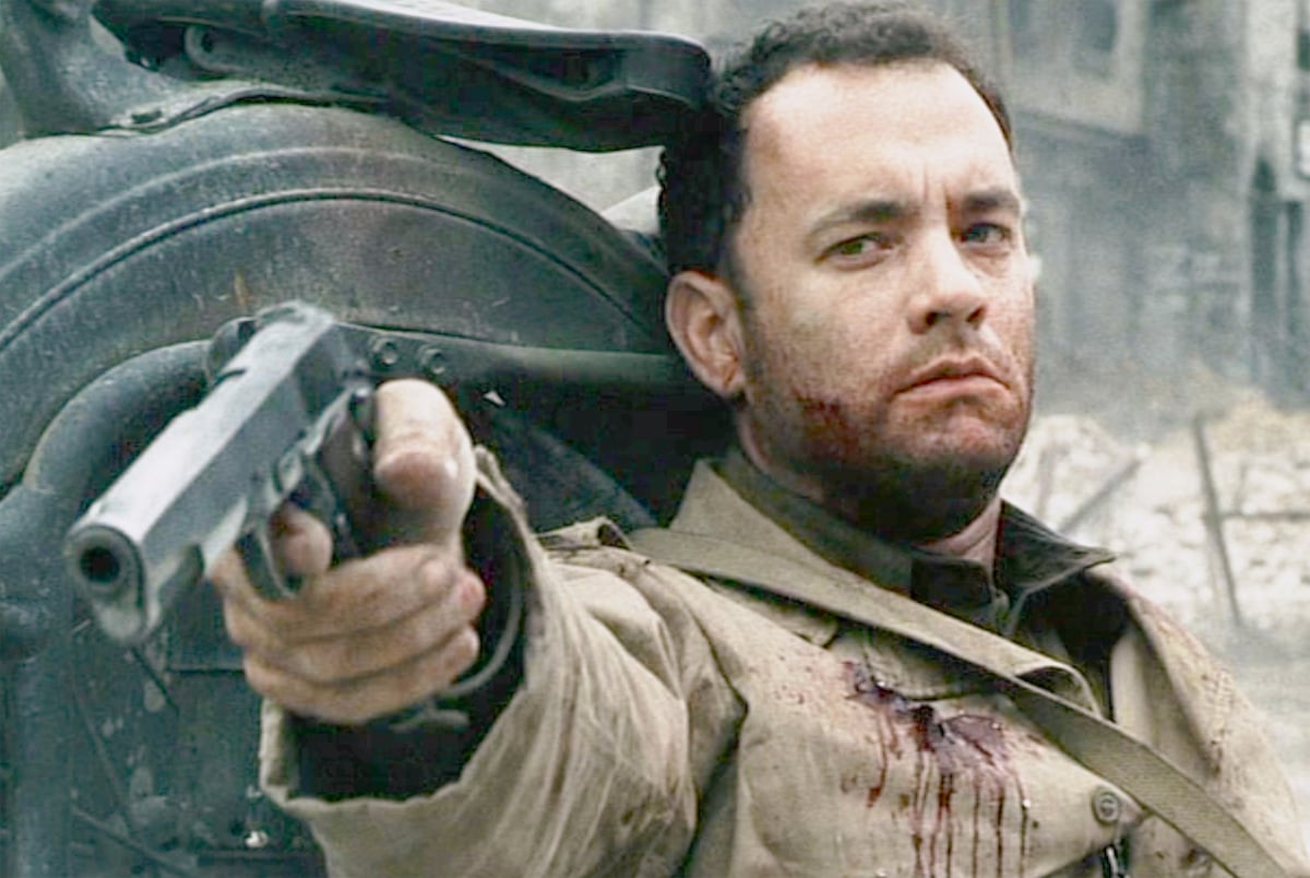 Tom Hanks weakly aims a pistol in a scene from ‘Saving Private Ryan’