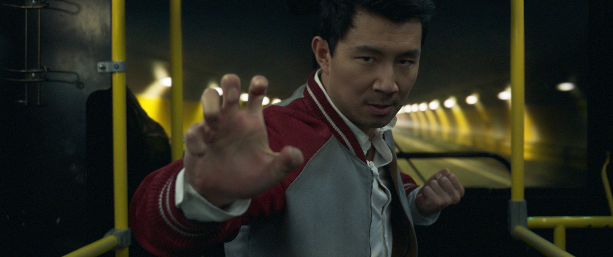 Simu Liu fighting in bus scene in 'Shang-Chi and the Legend of the Ten Rings'