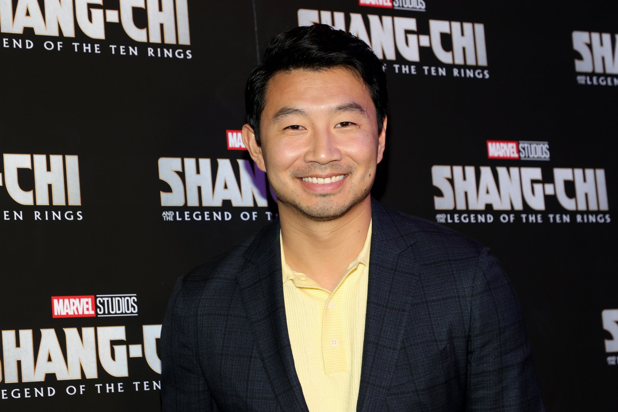 Simu Liu smiling at a 'Shang-Chi and the Legend of the Ten Rings' screening in New York