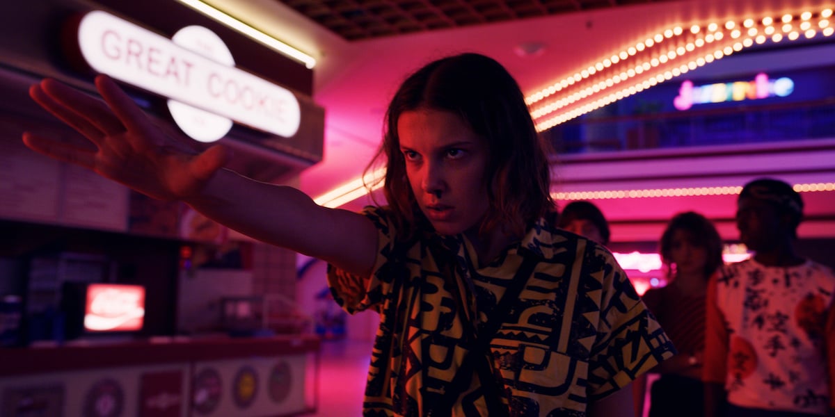 Eleven, played by Millie Bobby Brown, uses her powers on the Mindflayer in a production still from 'Stranger Things' Season 3.