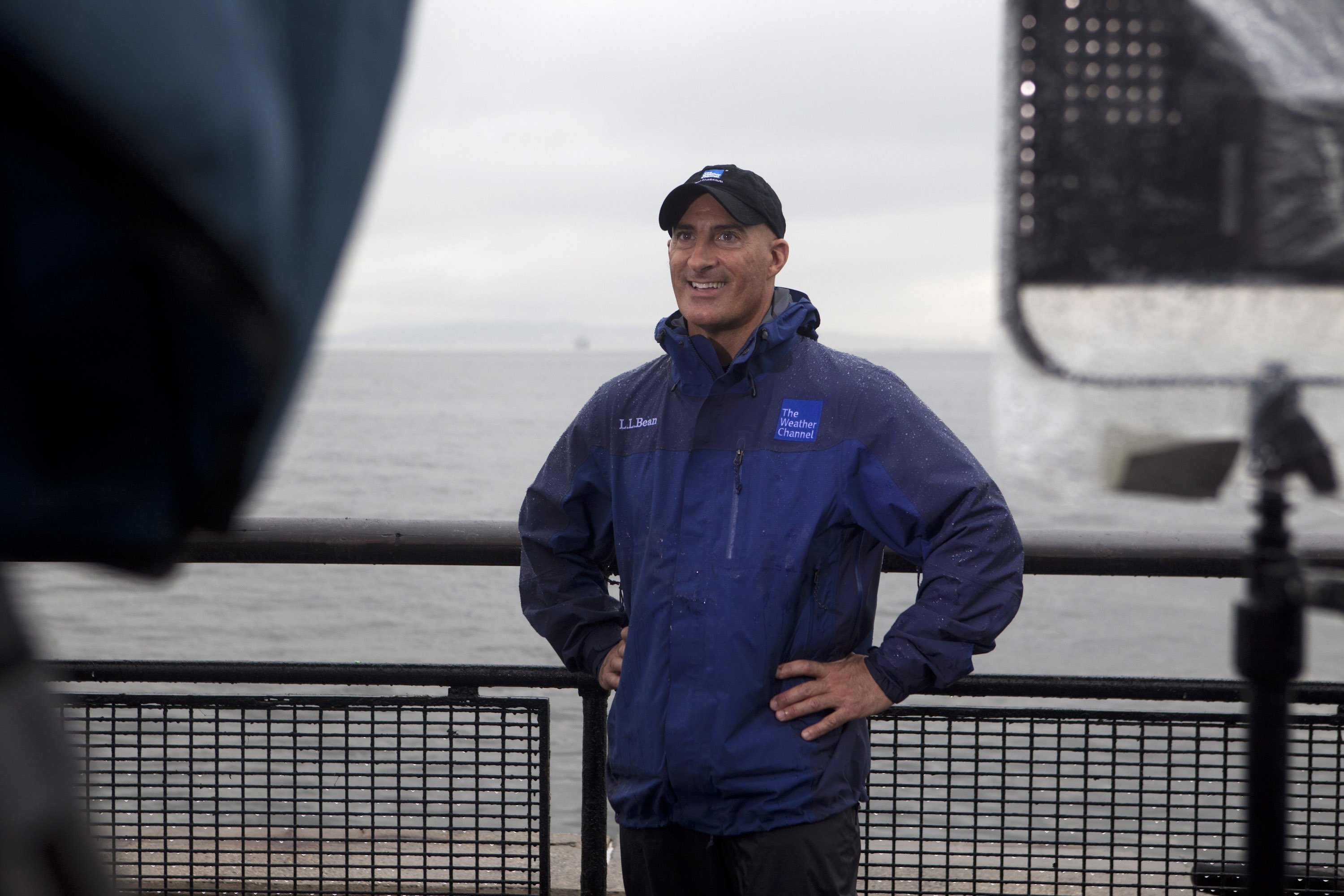 The Weather Channel's Jim Cantore standing in front of the camera as he reports on Hurricane Irene