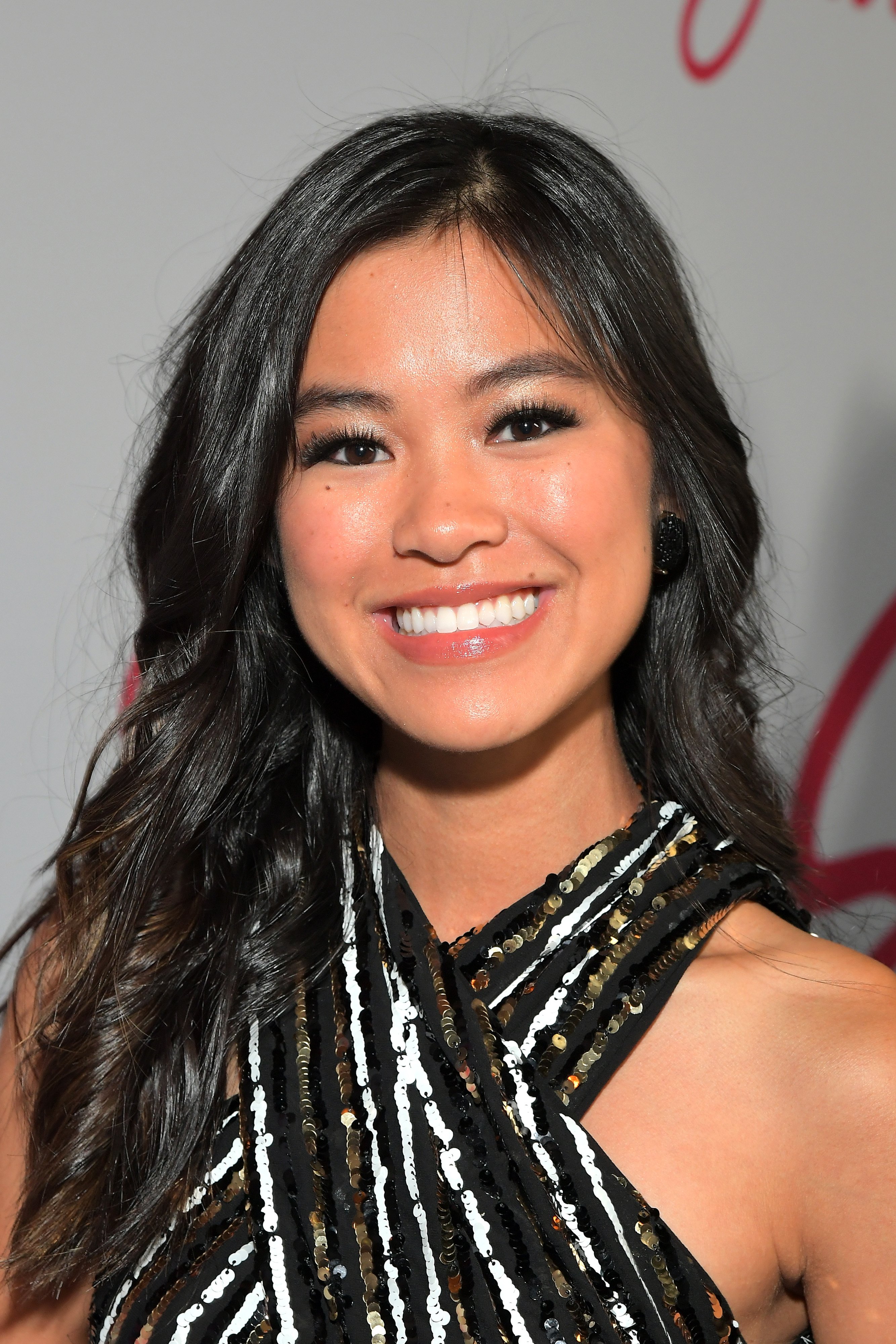 Tiffany Espensen is photographed arriving at the premiere of 'Let it Snow' in November 2019