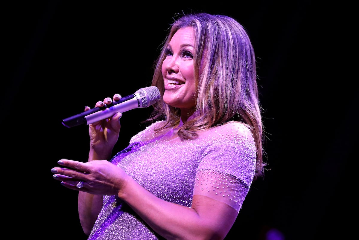 Vanessa Williams holding a microphone