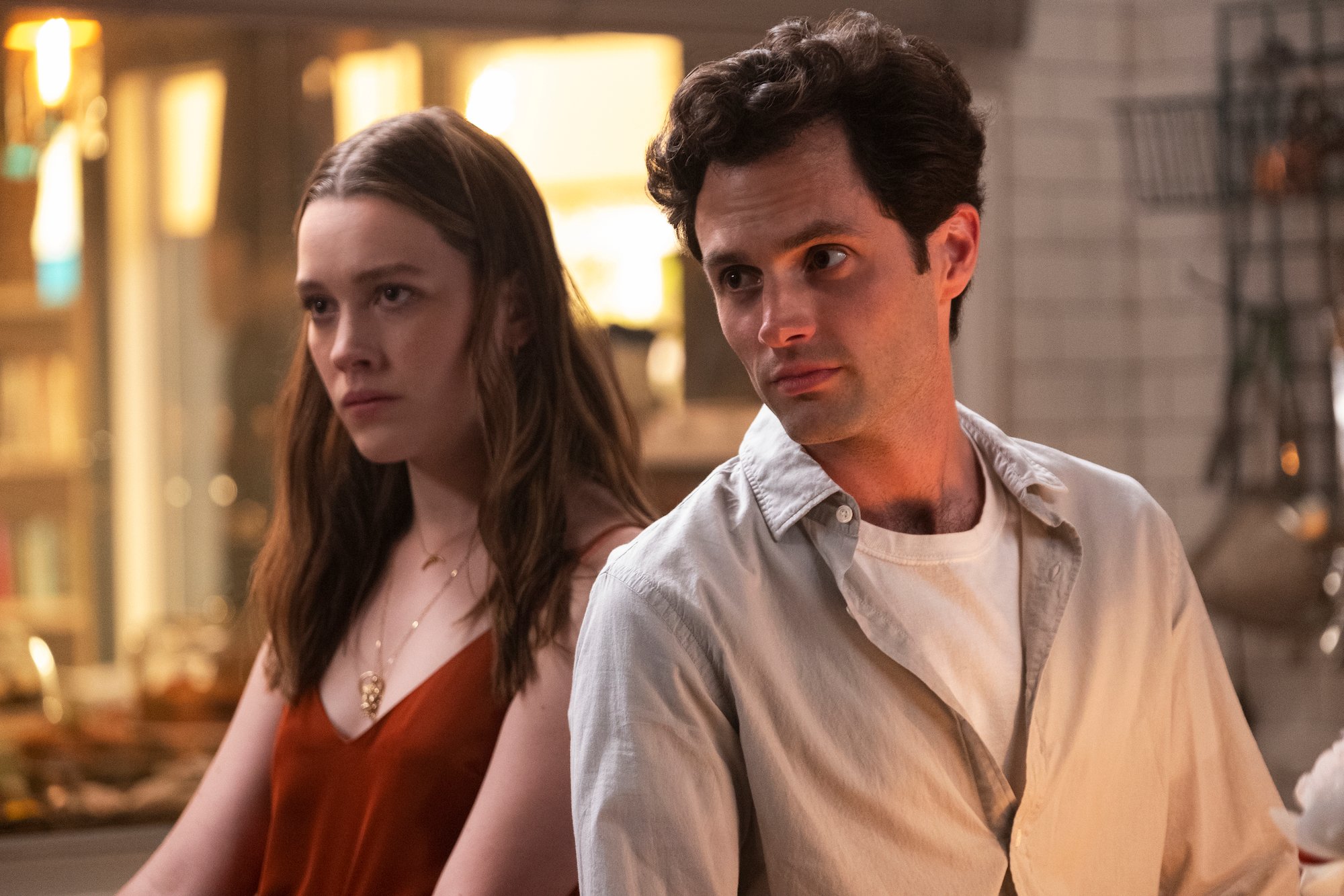 A production still of Victoria Pedretti and Penn Badgley as Love Quinn and Joe Goldberg in Netflix's 'YOU'